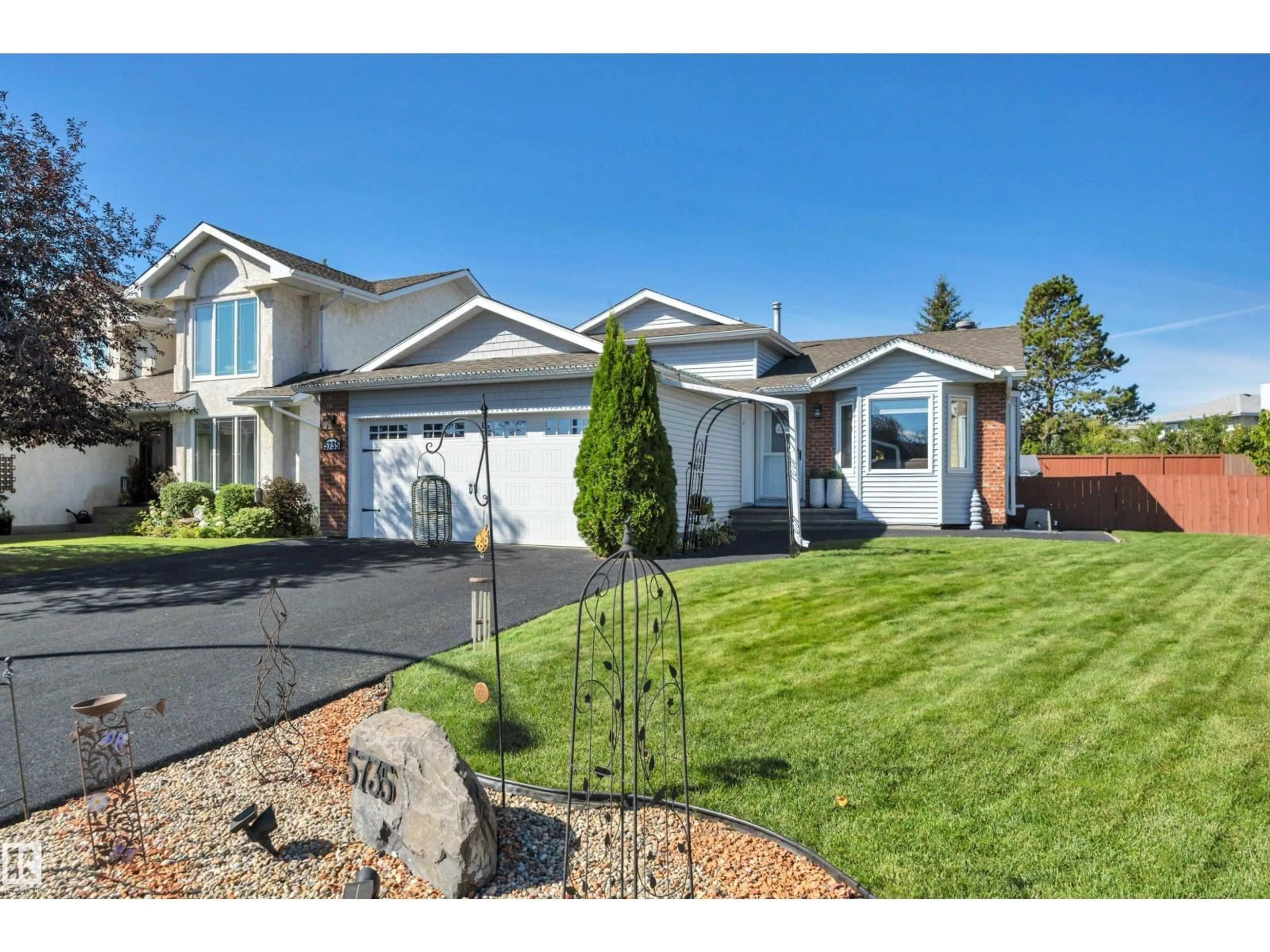 Home with vinyl exterior material, street for 5735 152A AV, Edmonton Alberta T5A4X7