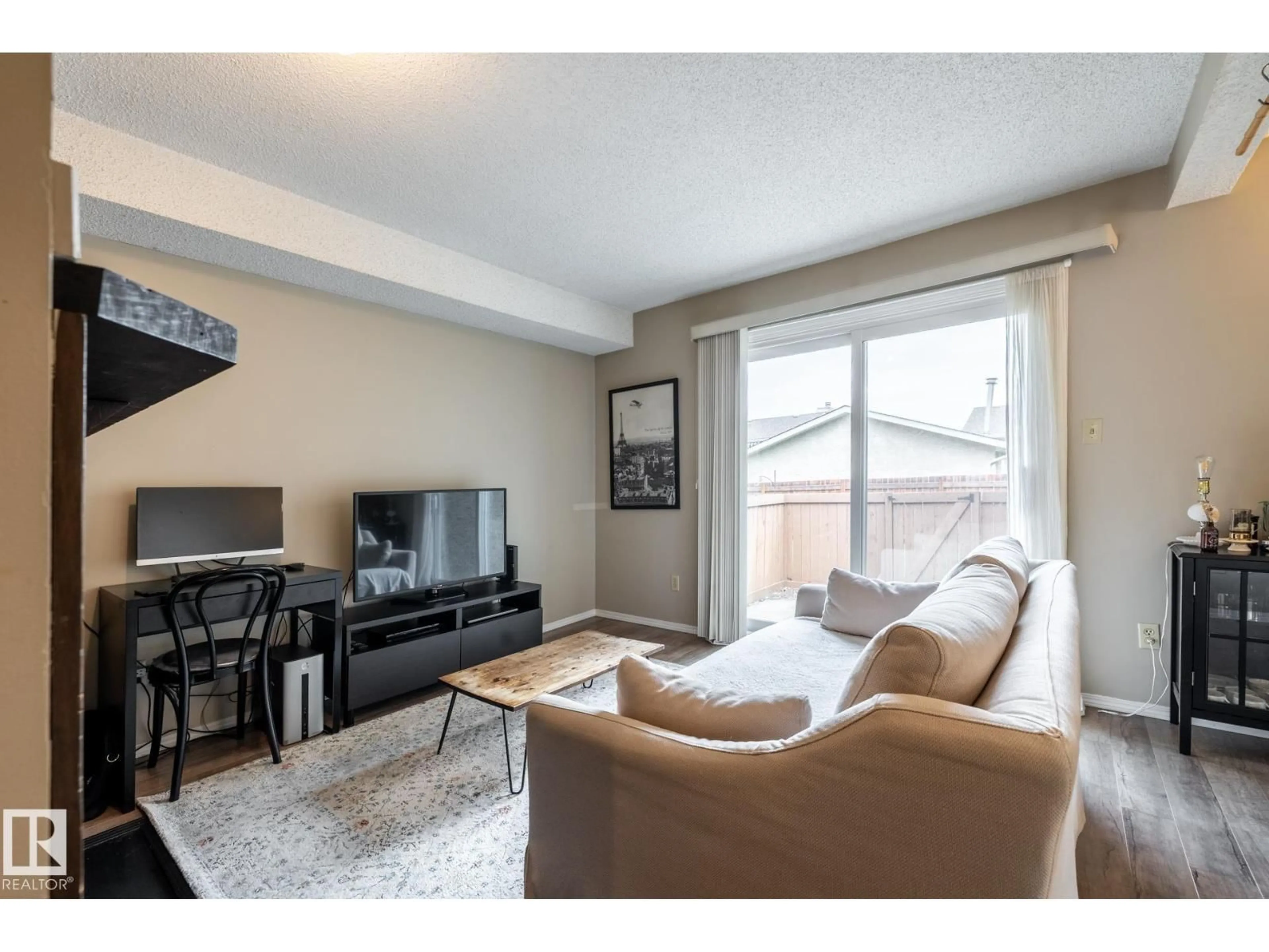 Living room with furniture, unknown for 20 3812 20 AV NW, Edmonton Alberta T6L4B2