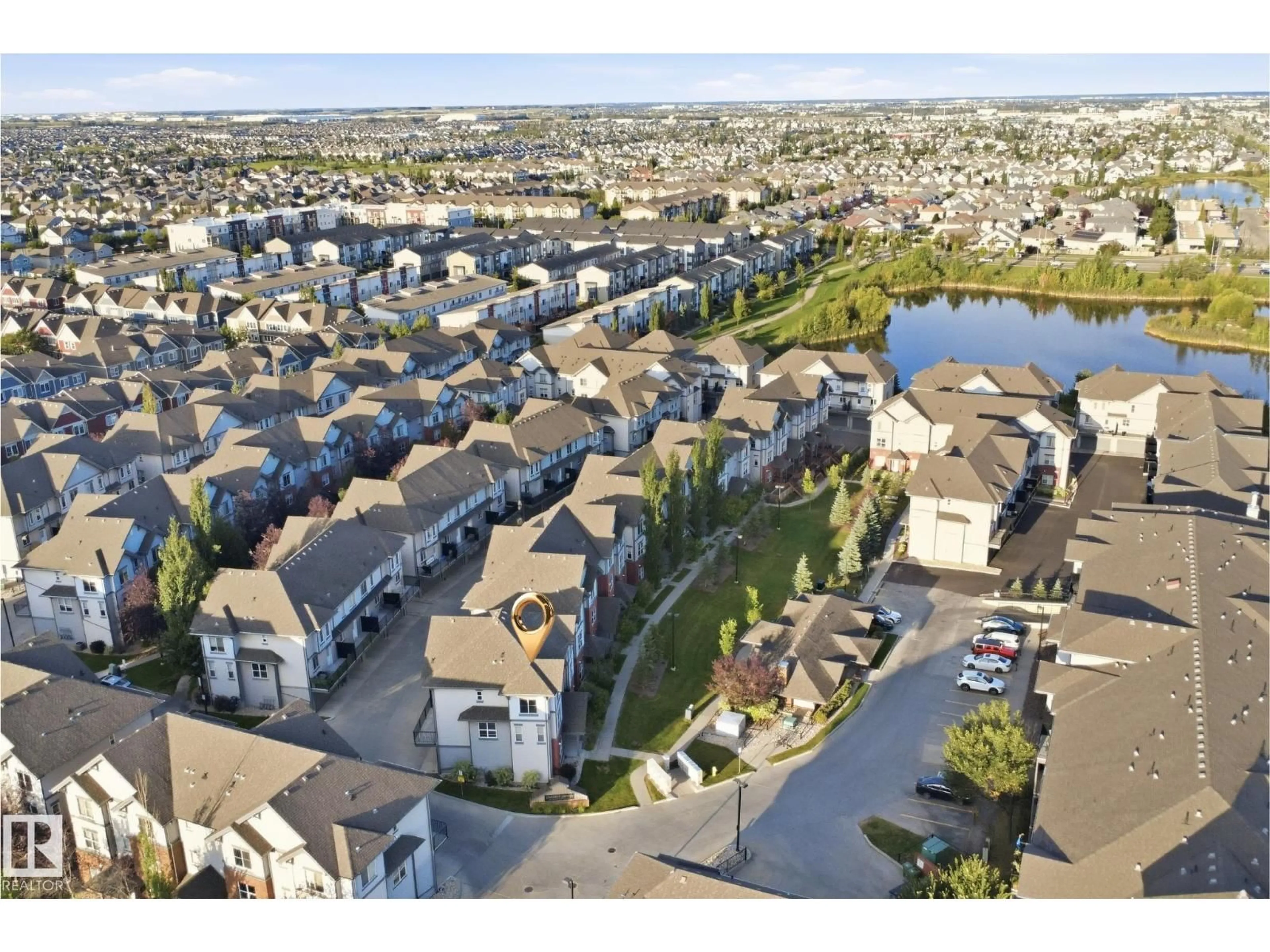 A pic from outside/outdoor area/front of a property/back of a property/a pic from drone, street for 655 - 60 WATT BV, Edmonton Alberta T6X0Y2