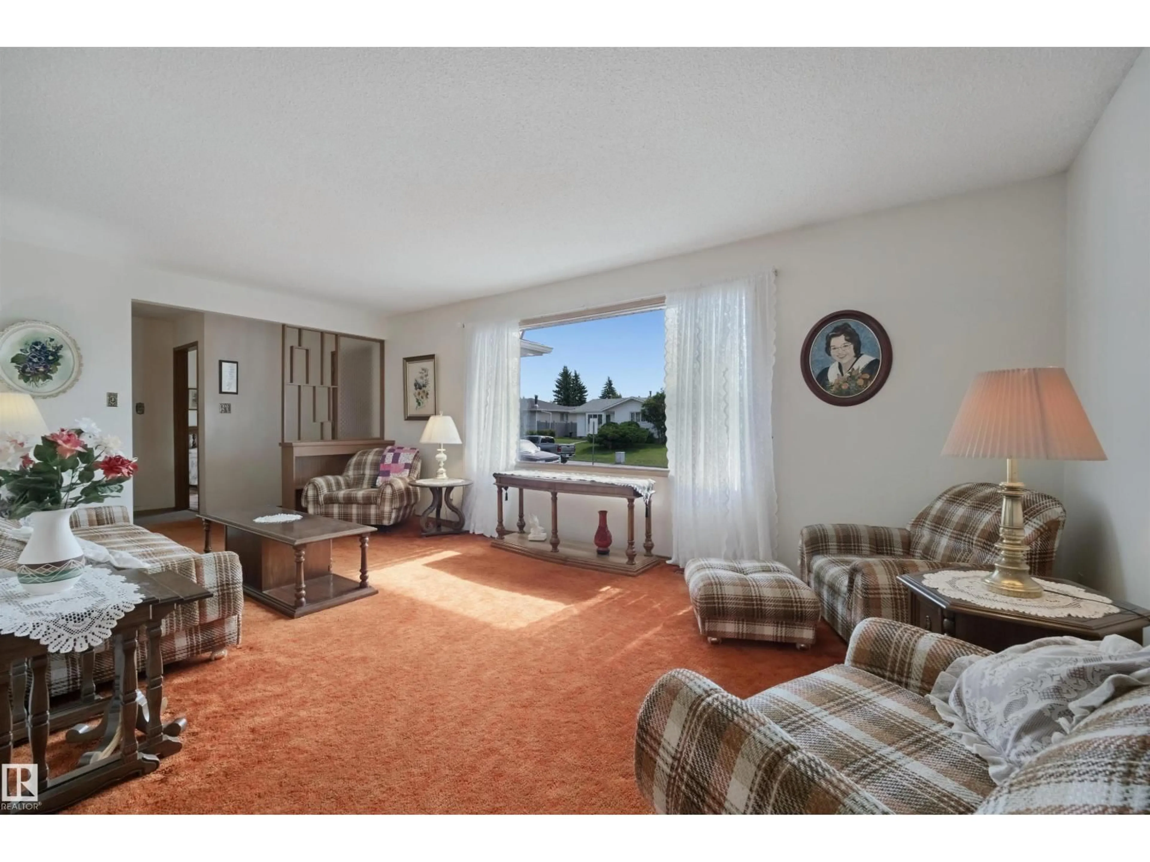 Living room with furniture, carpet floor for 6920 152A AV, Edmonton Alberta T5C2Y9