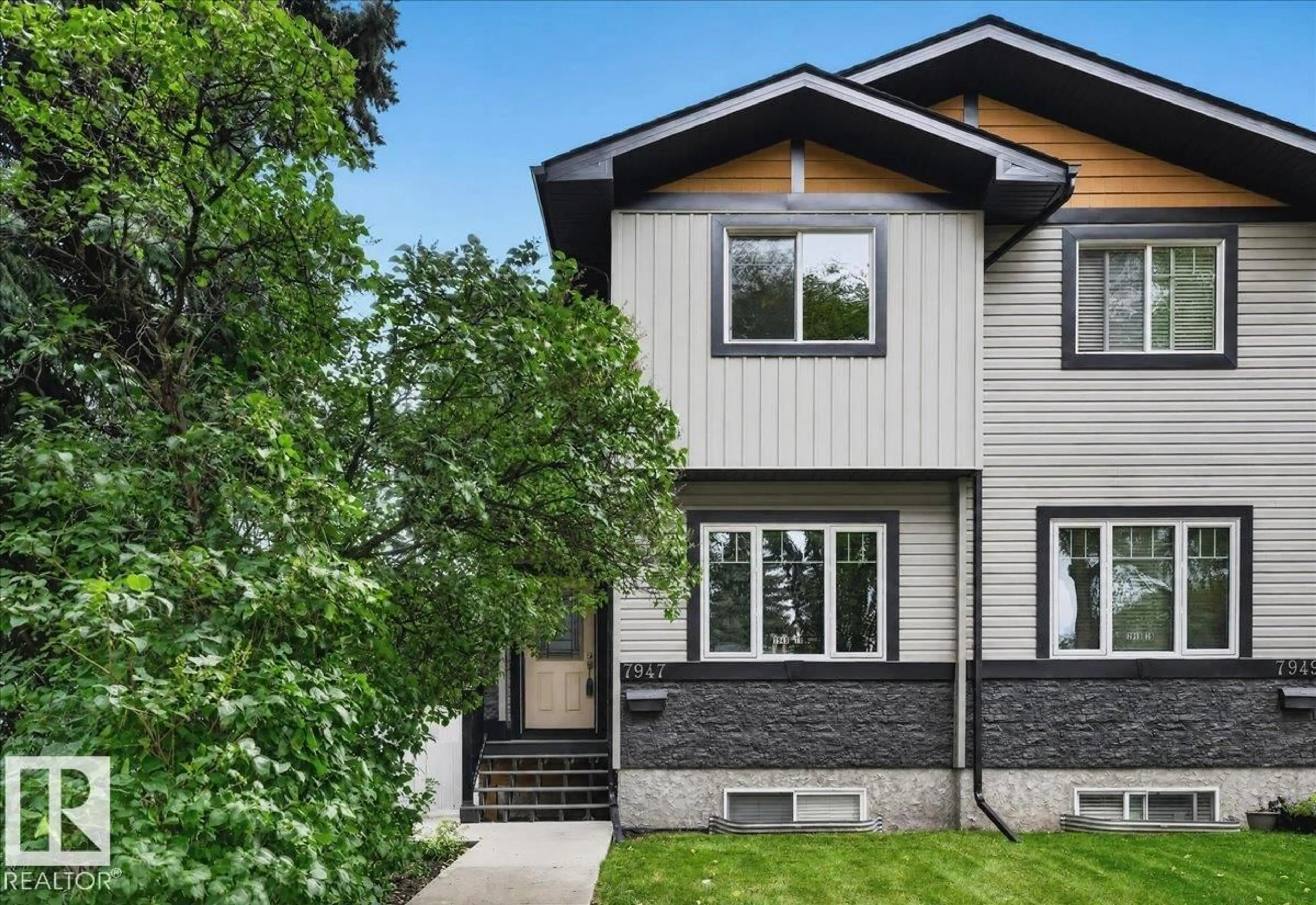 Home with vinyl exterior material, street for 7947 79 AV, Edmonton Alberta T6C0P7