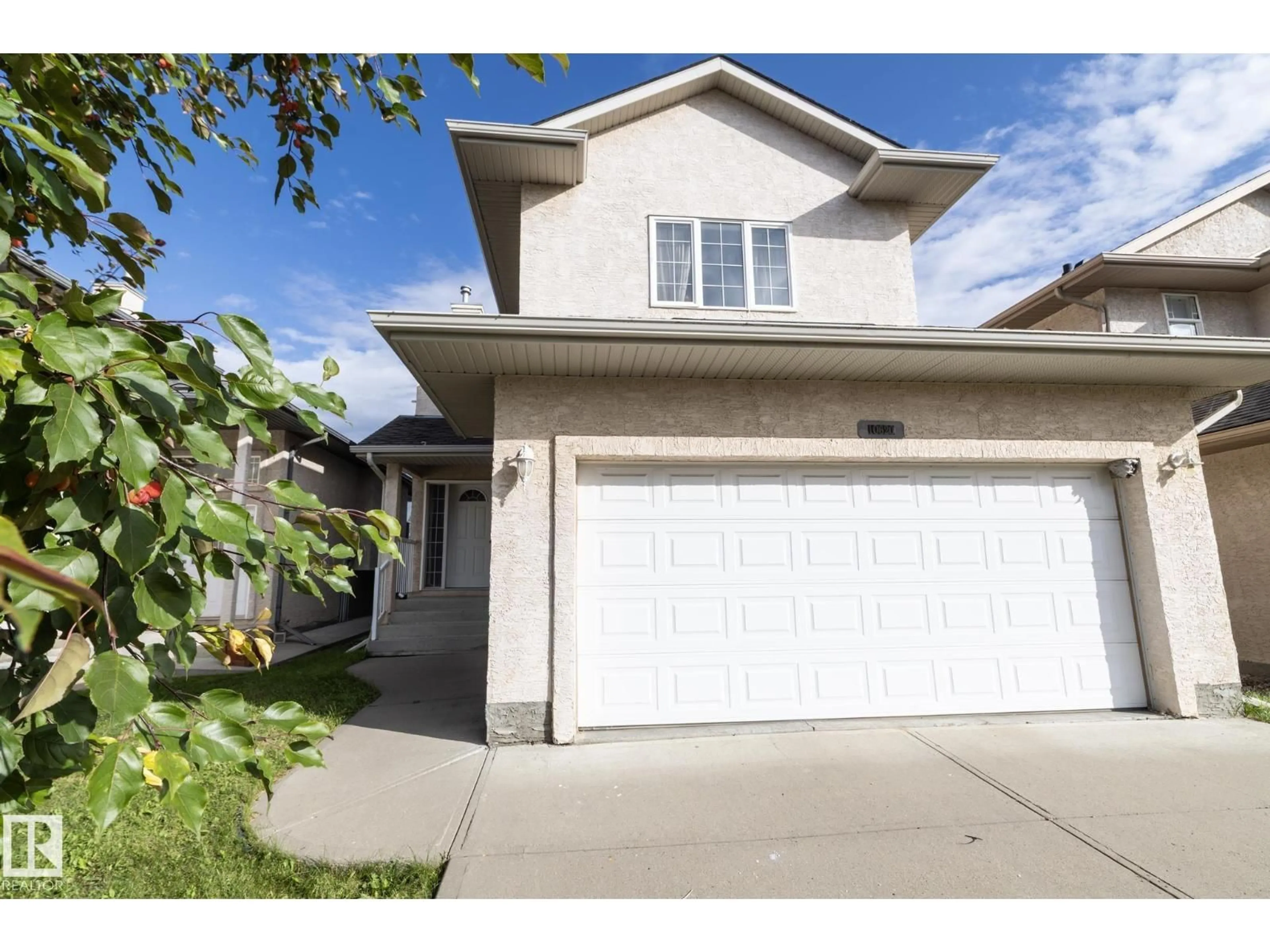 Home with vinyl exterior material, street for 10620 183 AV, Edmonton Alberta T5X6G5