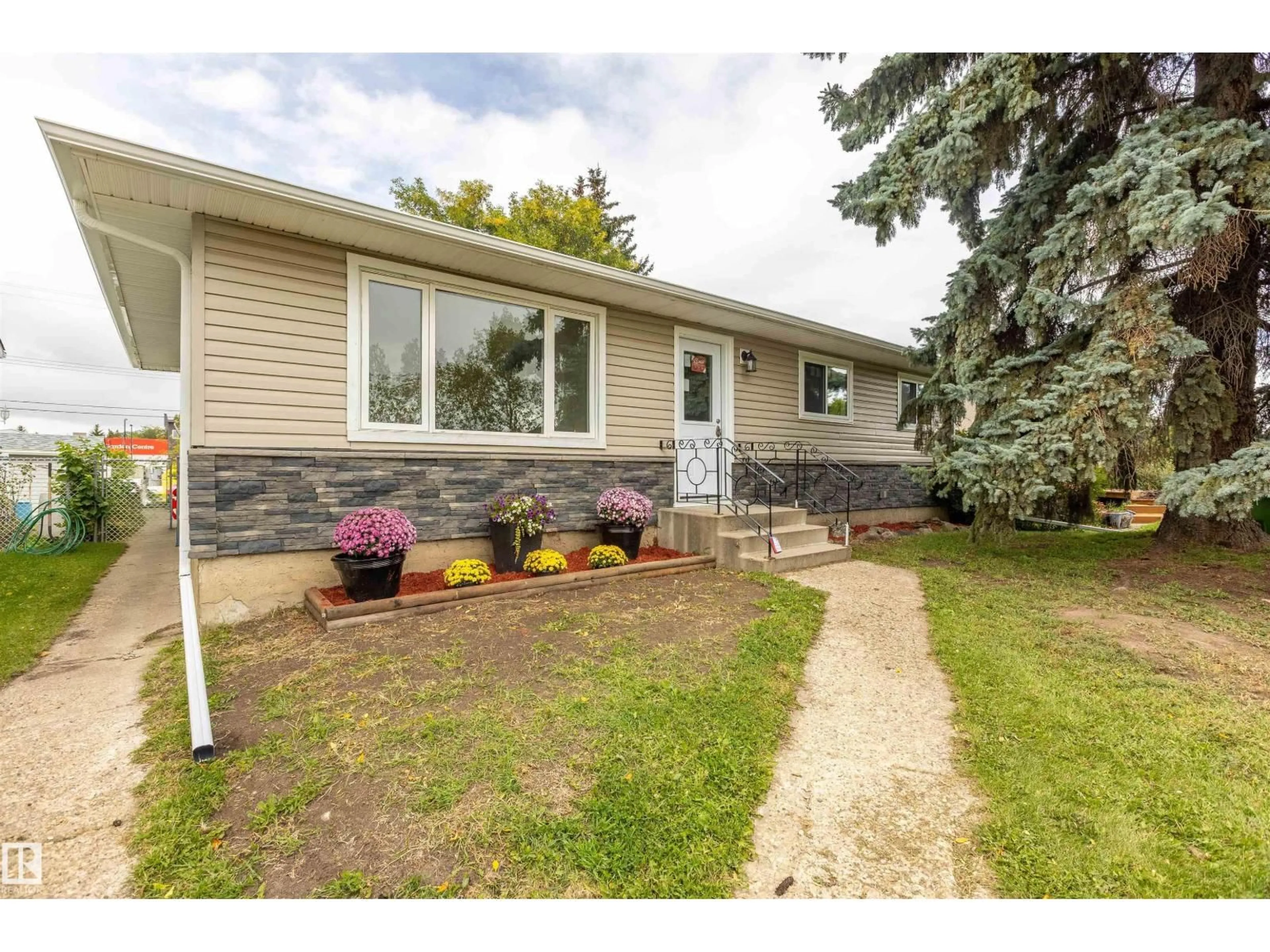 Home with vinyl exterior material, street for 9908 99 ST, Morinville Alberta T8R1G5