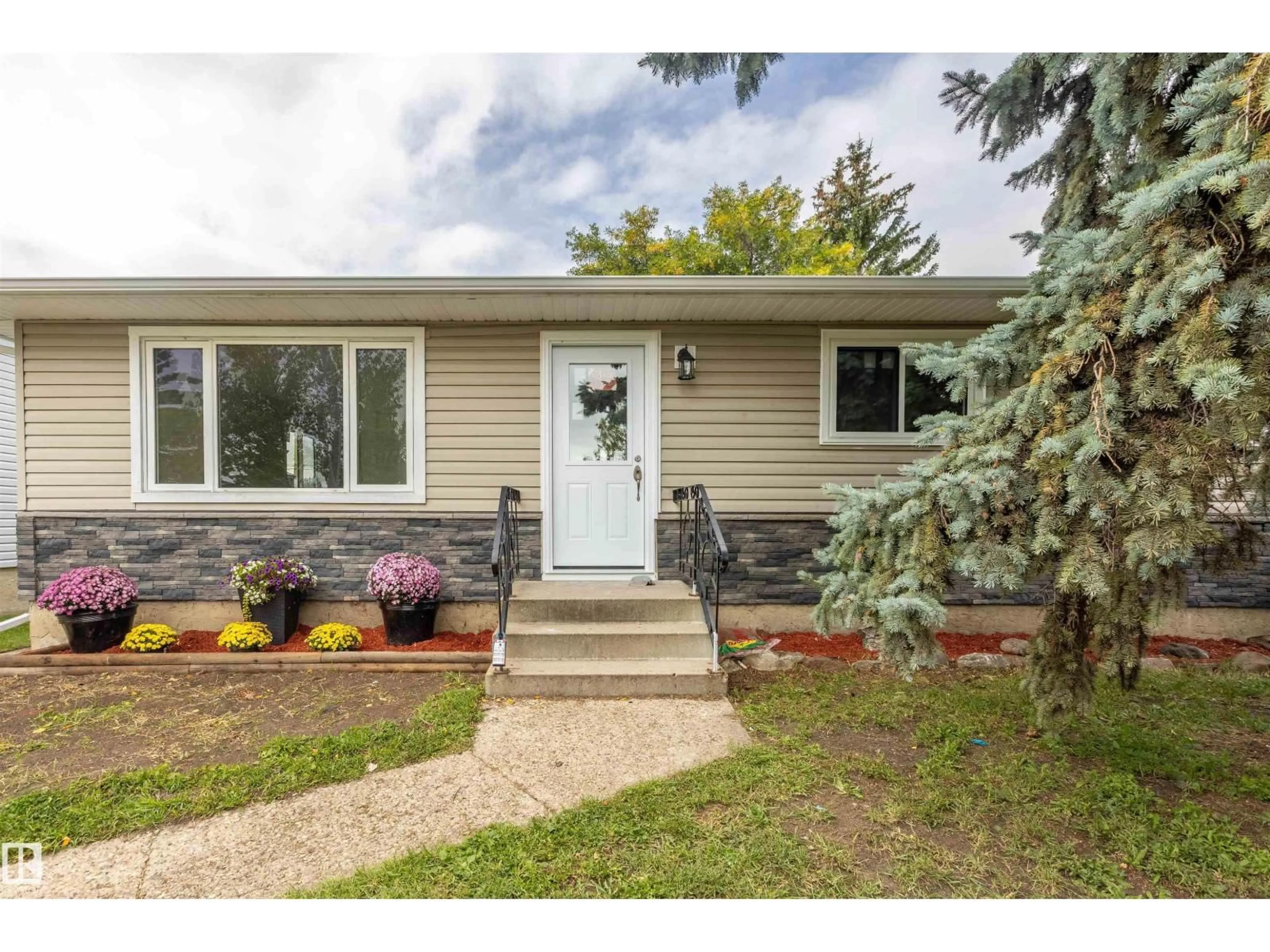 Home with vinyl exterior material, street for 9908 99 ST, Morinville Alberta T8R1G5