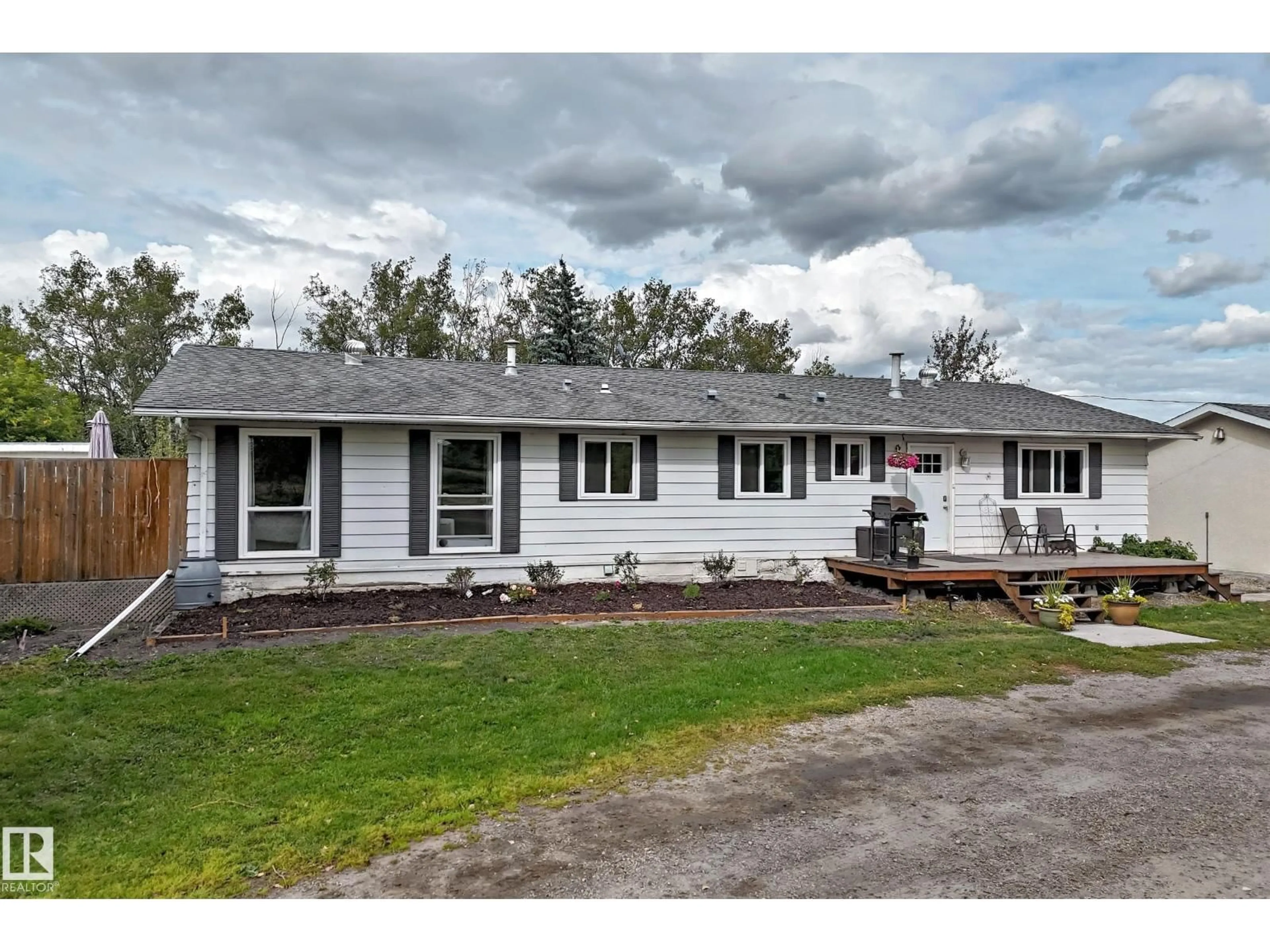 Home with vinyl exterior material, street for 23230 TWP ROAD 520, Rural Strathcona County Alberta T8B1G3