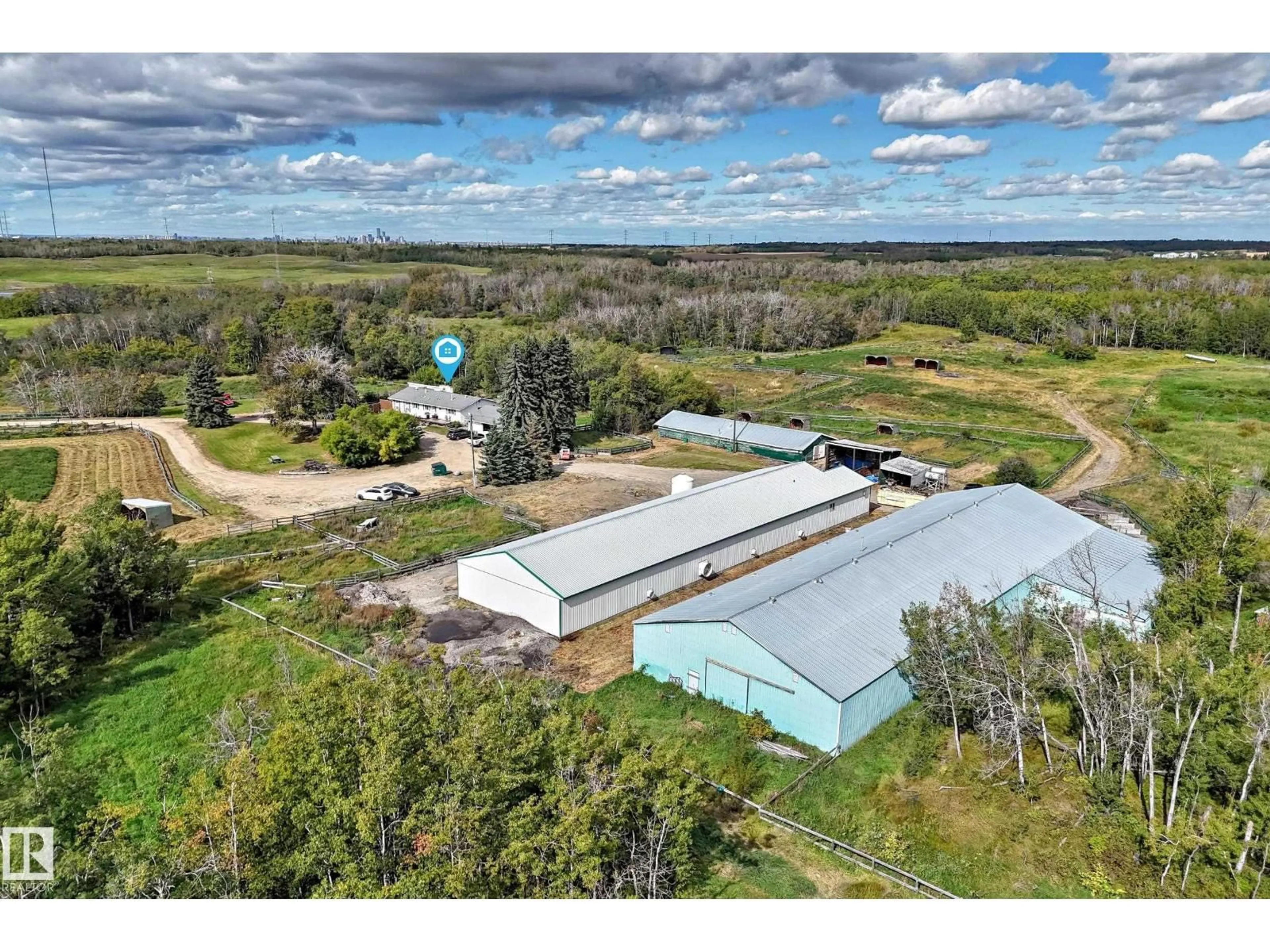 A pic from outside/outdoor area/front of a property/back of a property/a pic from drone, building for 23230 TWP ROAD 520, Rural Strathcona County Alberta T8B1G3