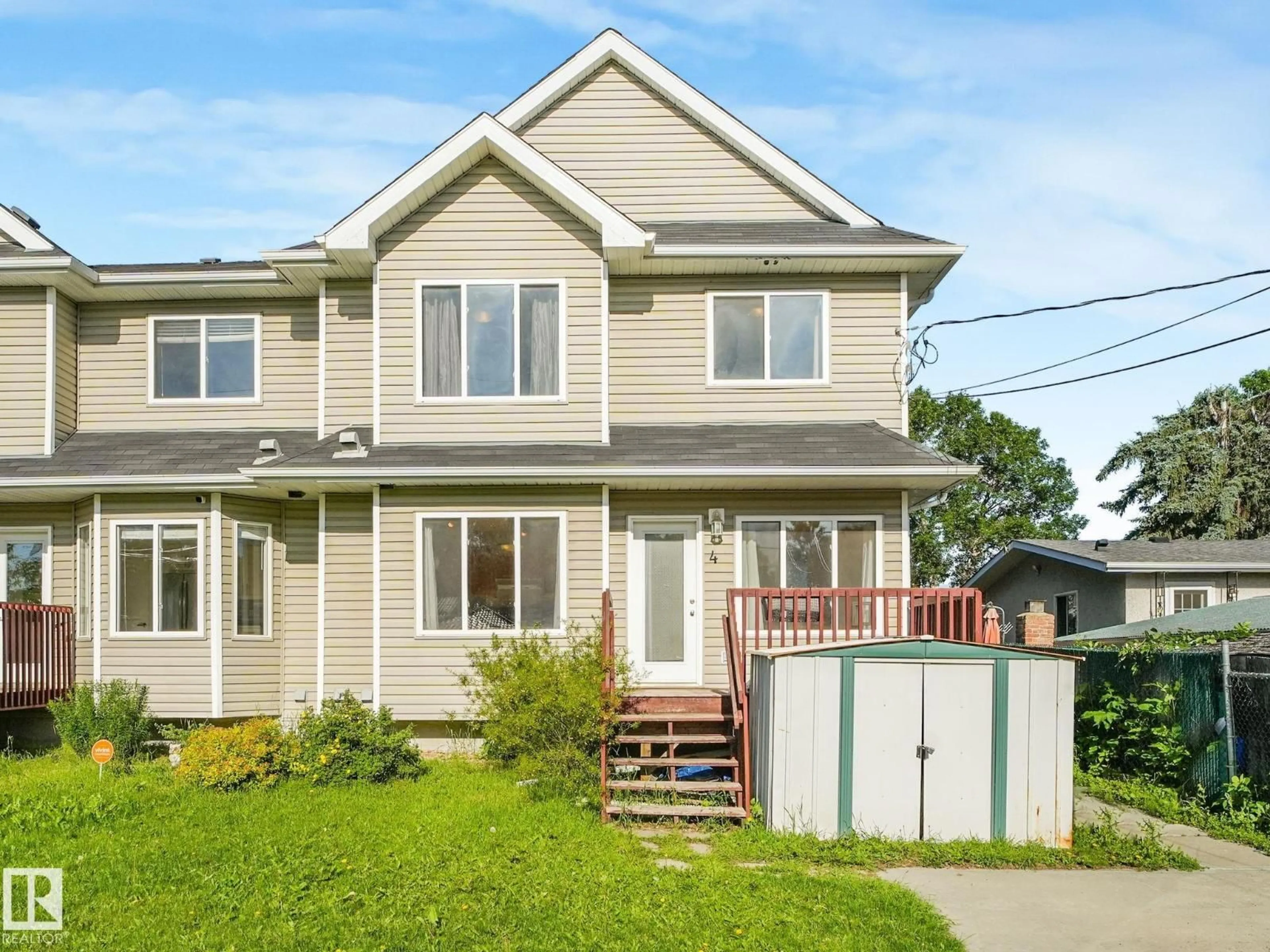 Home with vinyl exterior material, street for #4 - 11813 43 ST, Edmonton Alberta T5W2P3