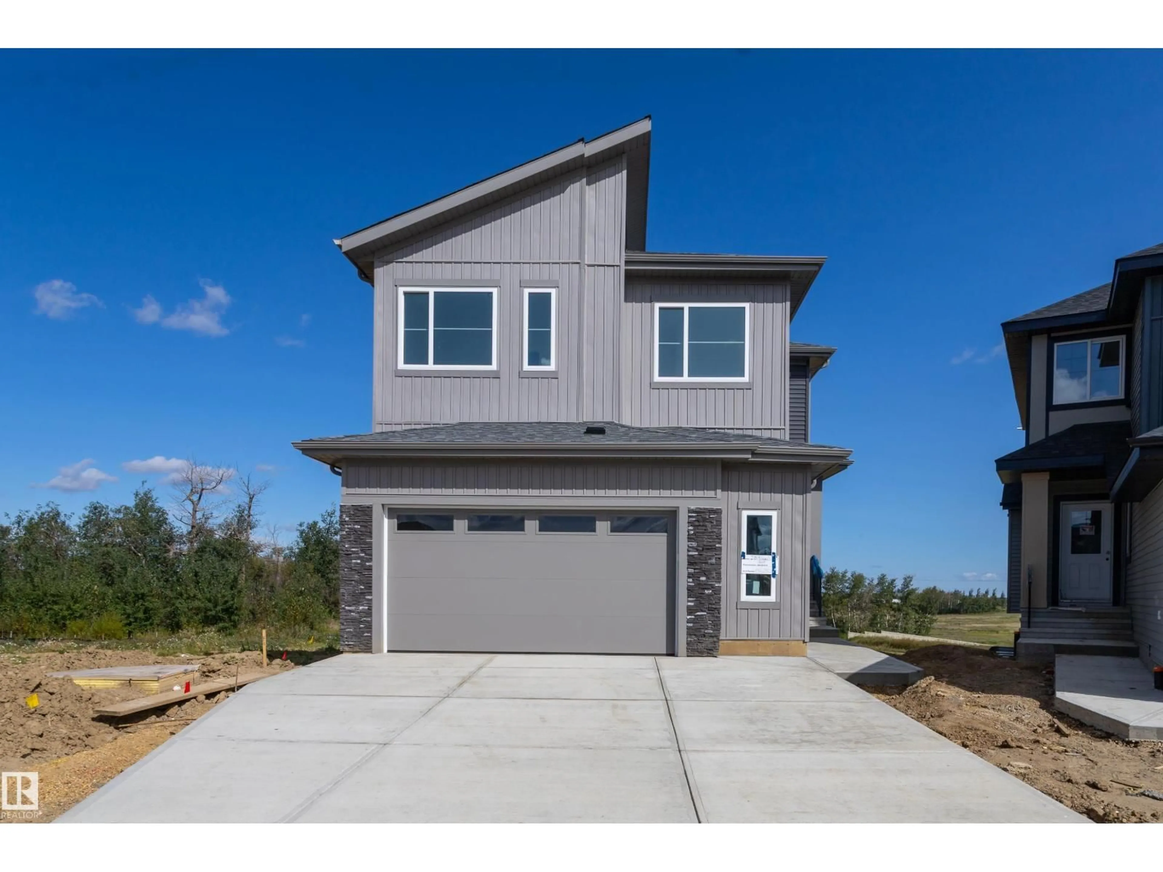 Home with vinyl exterior material, street for 2319 CROSSBILL CO, Edmonton Alberta T5S0Y7