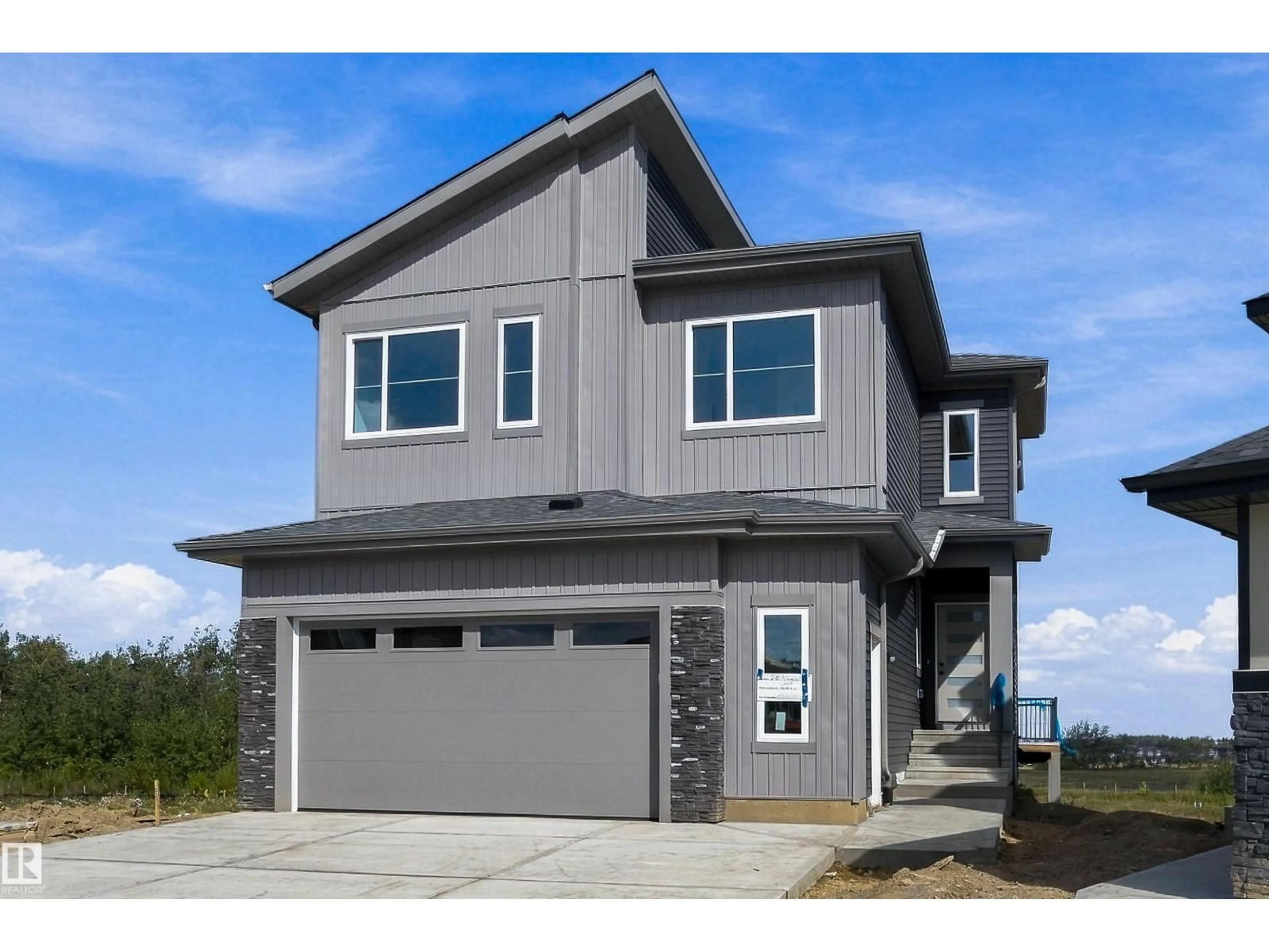 Home with vinyl exterior material, street for 2319 CROSSBILL CO, Edmonton Alberta T5S0Y7