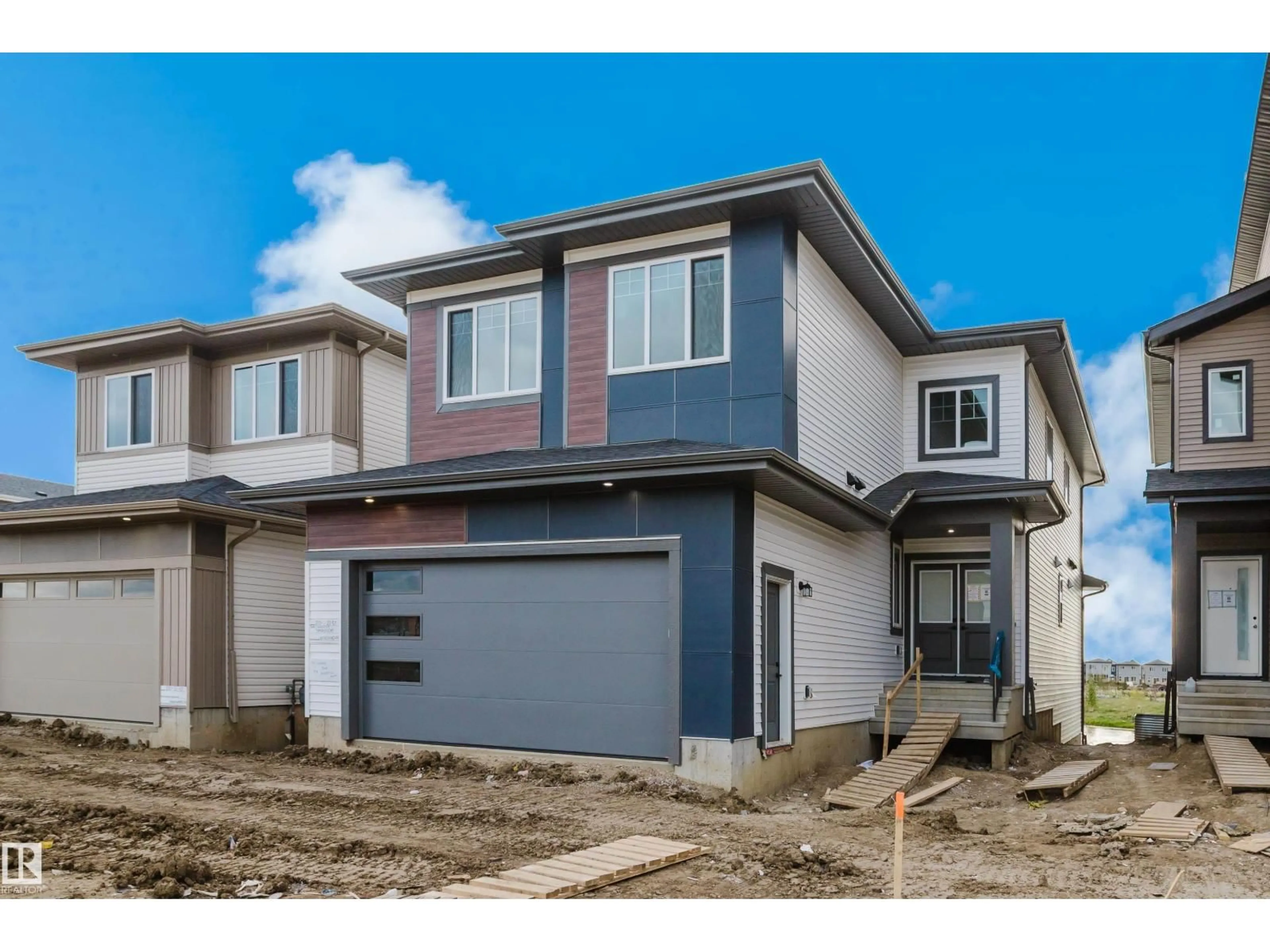 Home with vinyl exterior material, street for 216 21 ST, Edmonton Alberta T6X3C9