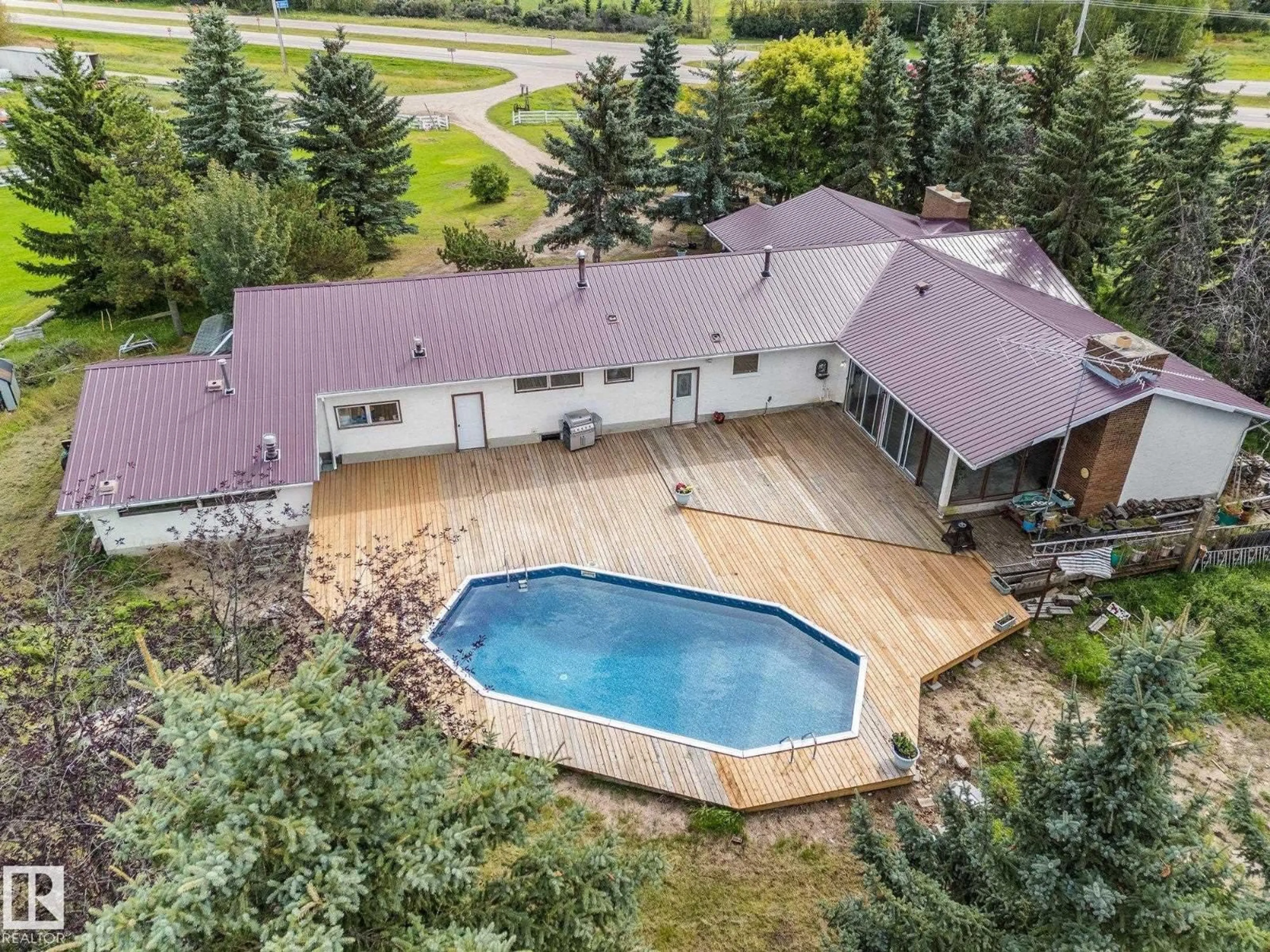 A pic from outside/outdoor area/front of a property/back of a property/a pic from drone, unknown for 2324 HGHWAY 16, Rural Parkland County Alberta T7Y0G7