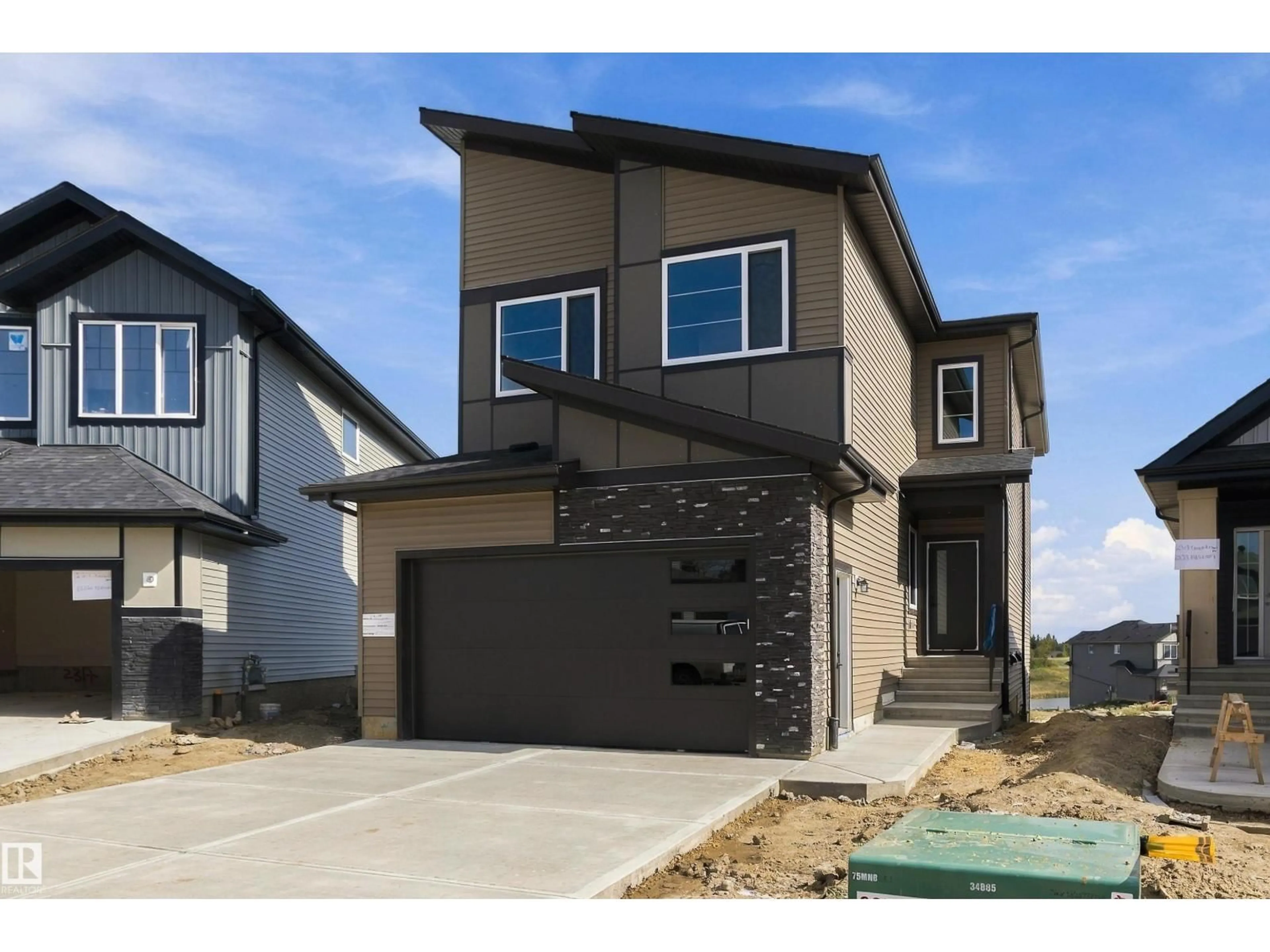 Home with vinyl exterior material, street for NW - 2315 CROSSBILL CO, Edmonton Alberta T5S0Y7