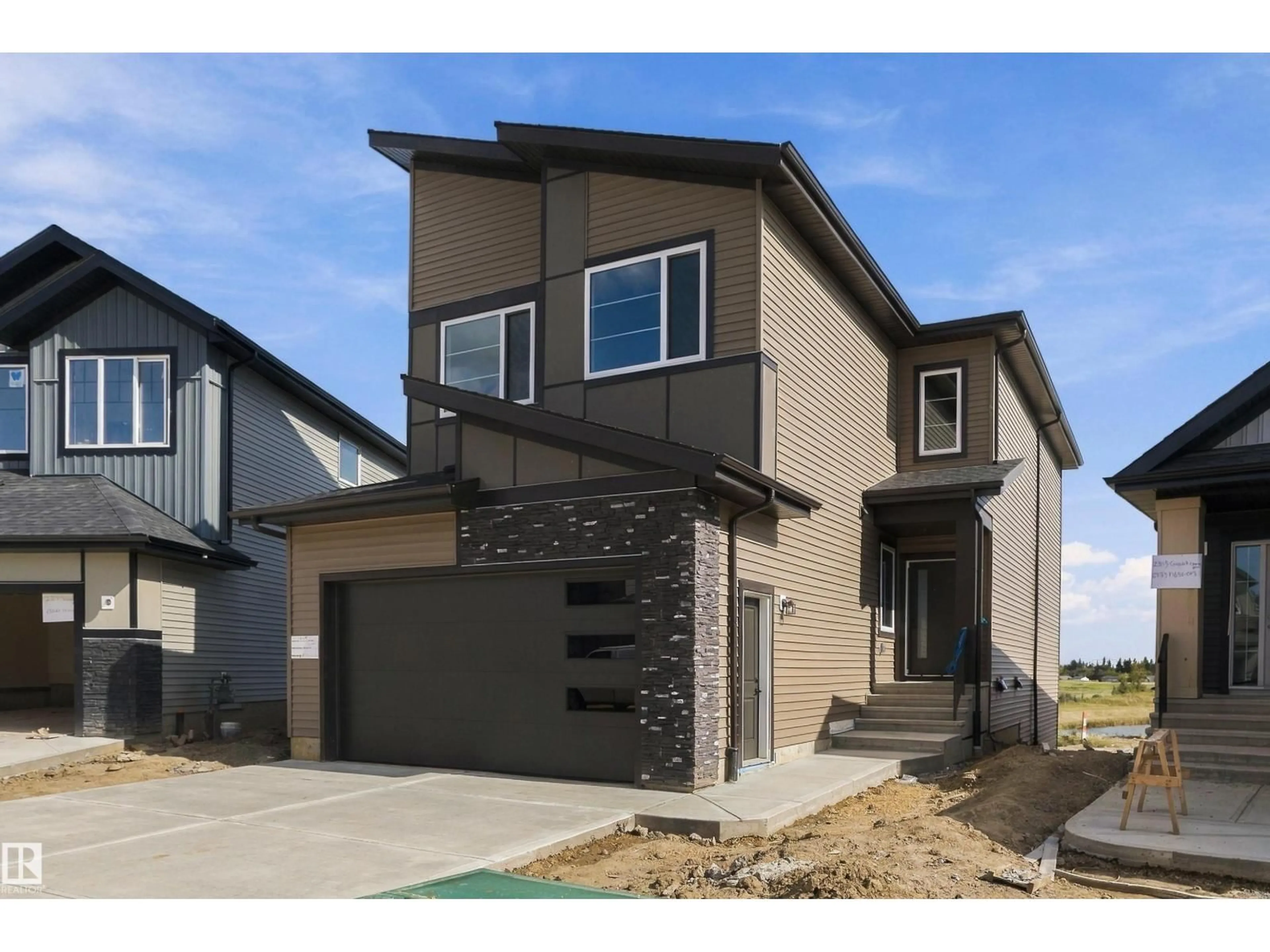 Home with vinyl exterior material, street for NW - 2315 CROSSBILL CO, Edmonton Alberta T5S0Y7