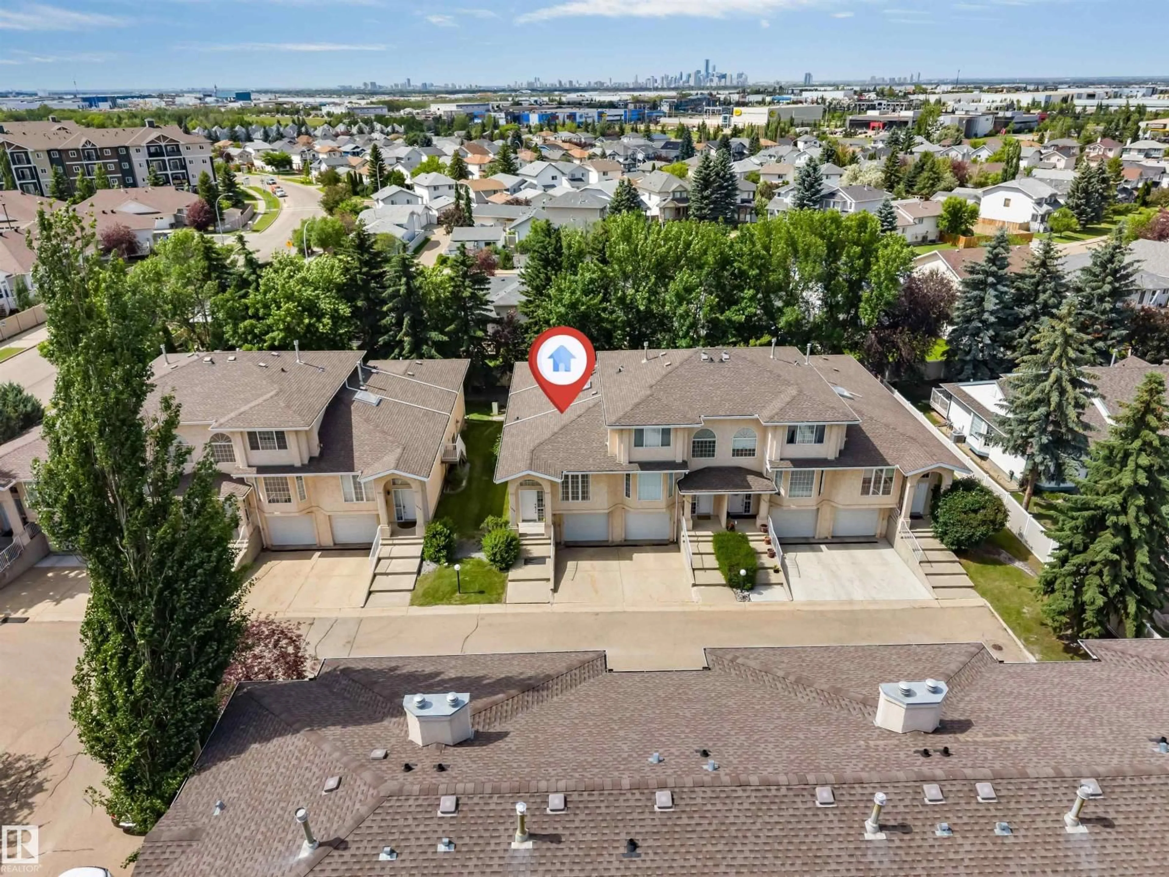 A pic from outside/outdoor area/front of a property/back of a property/a pic from drone, city buildings view from balcony for 1646 JAMHA RD, Edmonton Alberta T6L6V7