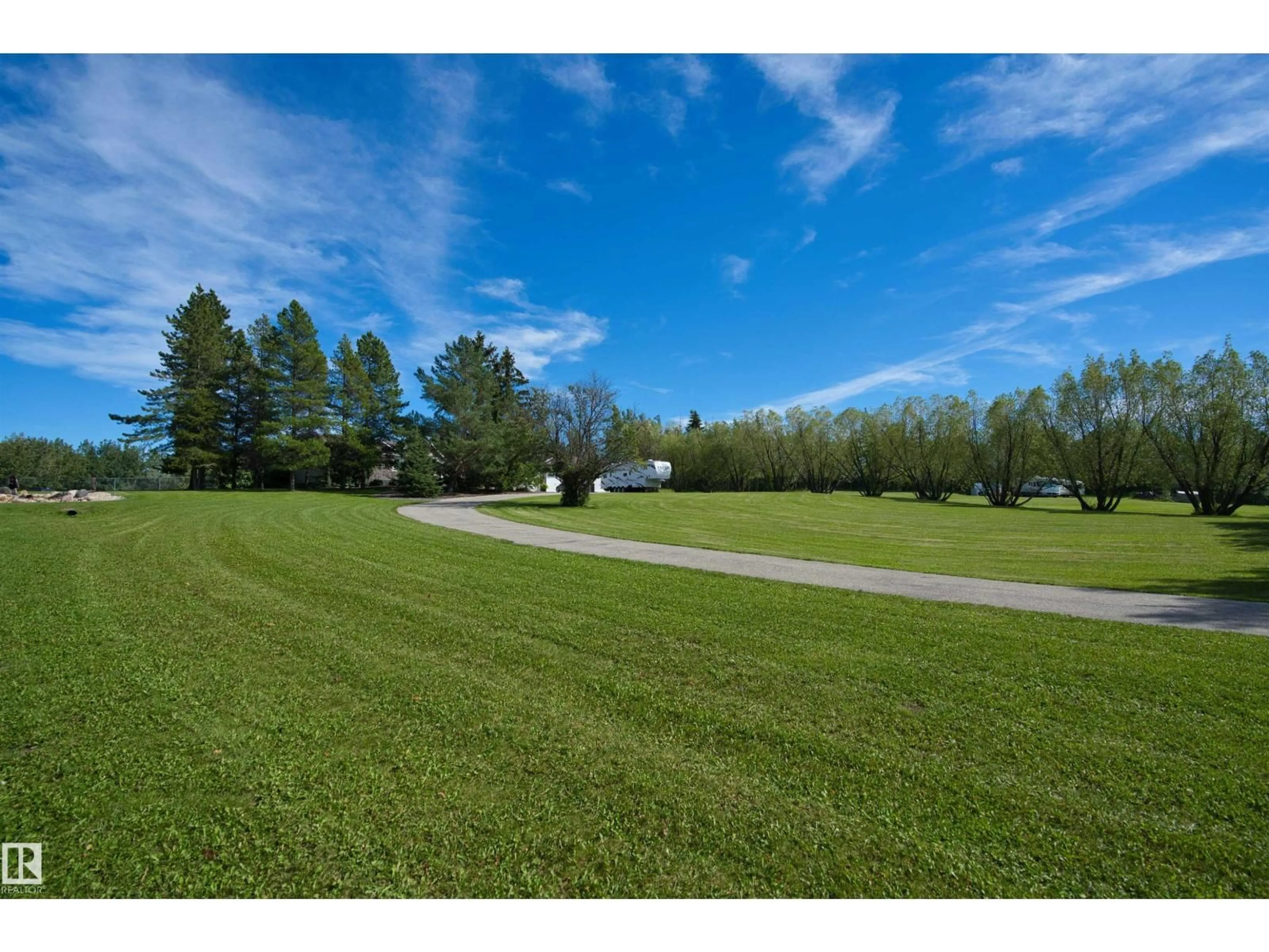 A pic from outside/outdoor area/front of a property/back of a property/a pic from drone, unknown for 39 RGE ROAD 274 RGE ROAD, Rural Parkland County Alberta T7X3T1