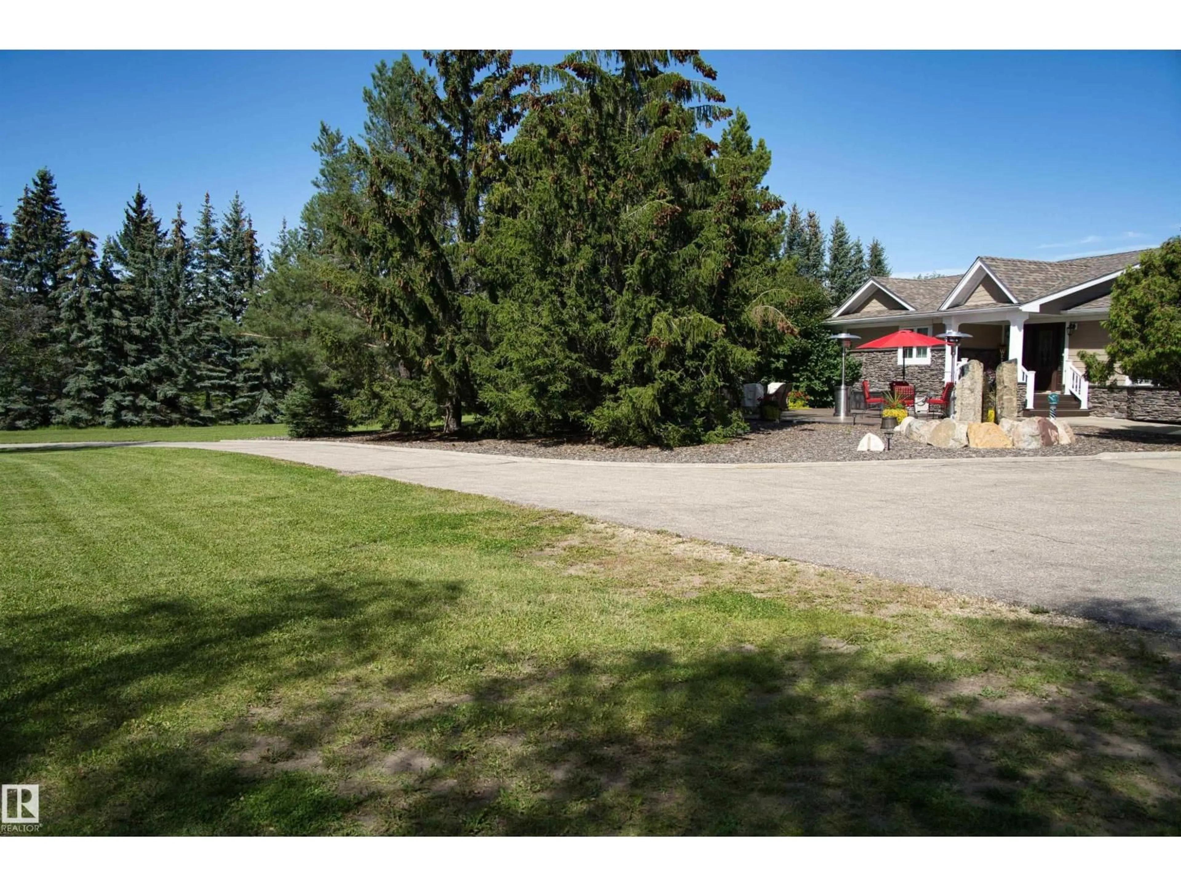 A pic from outside/outdoor area/front of a property/back of a property/a pic from drone, unknown for 39 RGE ROAD 274 RGE ROAD, Rural Parkland County Alberta T7X3T1