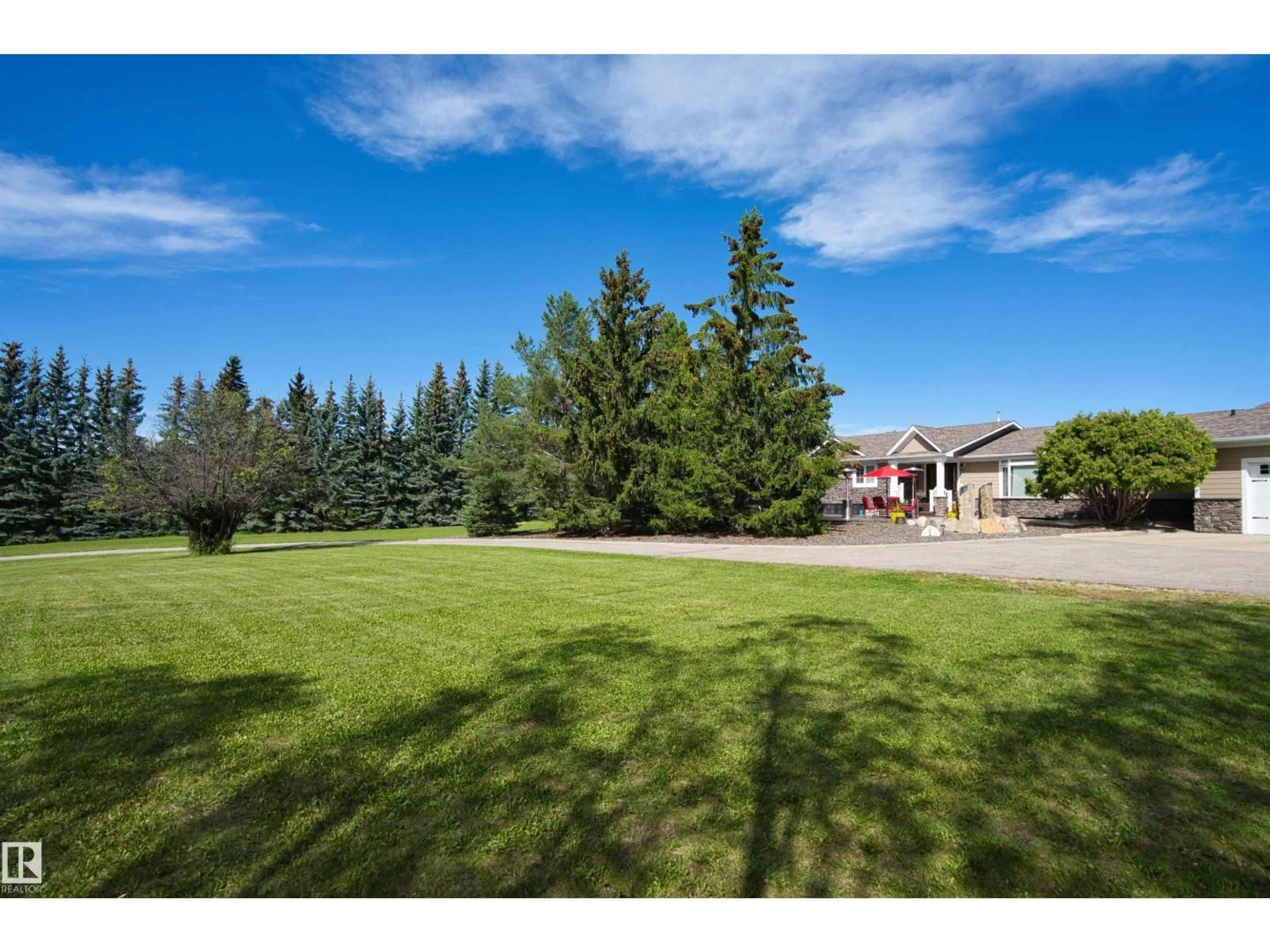 A pic from outside/outdoor area/front of a property/back of a property/a pic from drone, unknown for 39 RGE ROAD 274 RGE ROAD, Rural Parkland County Alberta T7X3T1
