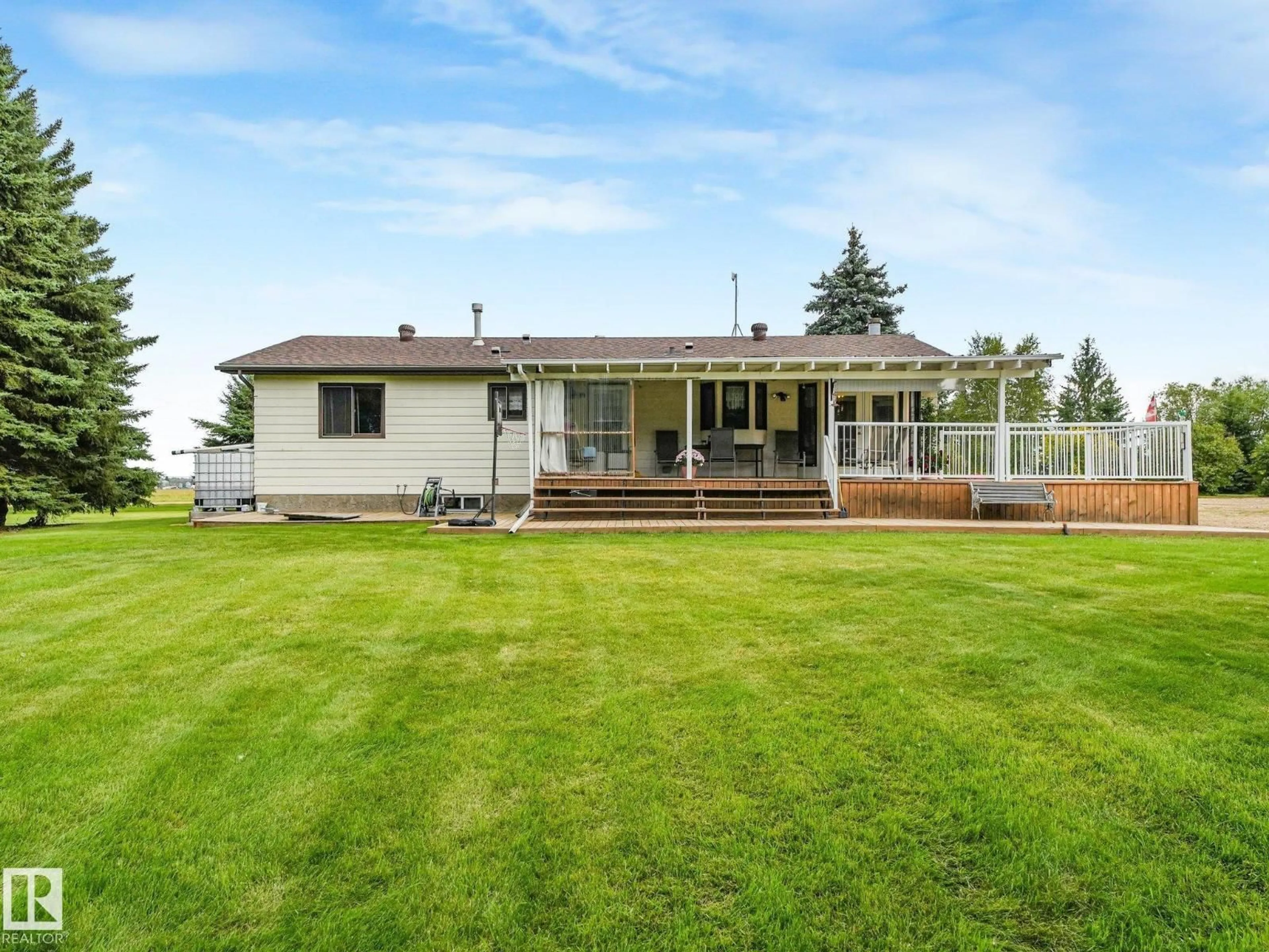 A pic from outside/outdoor area/front of a property/back of a property/a pic from drone, water/lake/river/ocean view for 59402 RR 220, Rural Thorhild County Alberta T0A3J0
