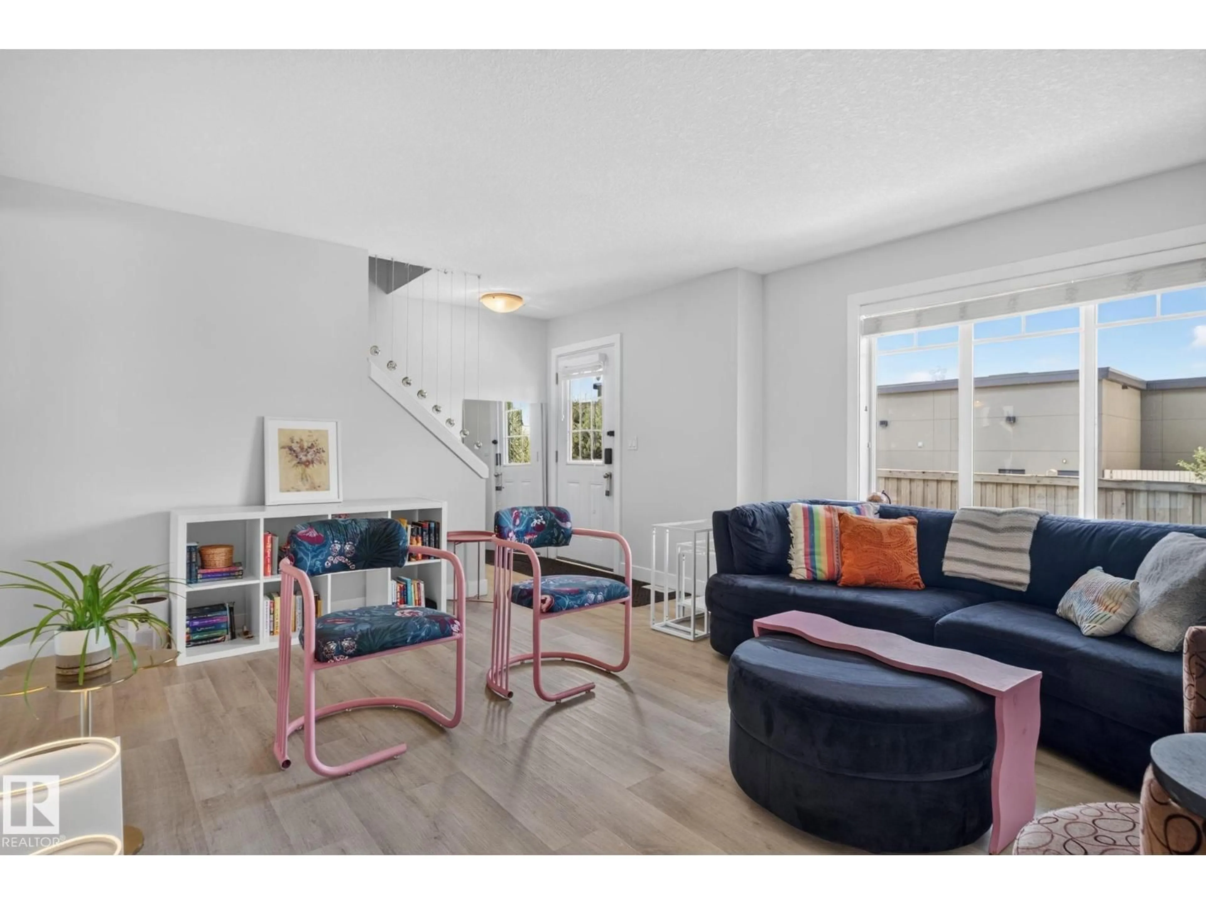 Living room with furniture, unknown for 5134 - 6 MULLEN RD, Edmonton Alberta T6R0S7