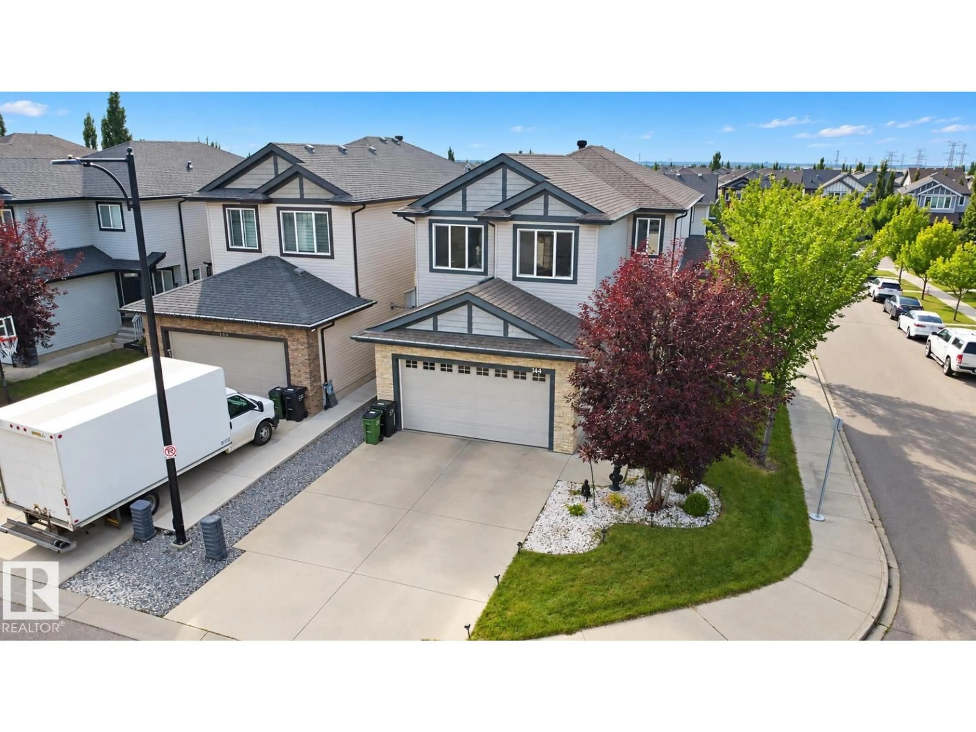 A pic from outside/outdoor area/front of a property/back of a property/a pic from drone, street for SW - 144 52 ST, Edmonton Alberta T6X0Z6