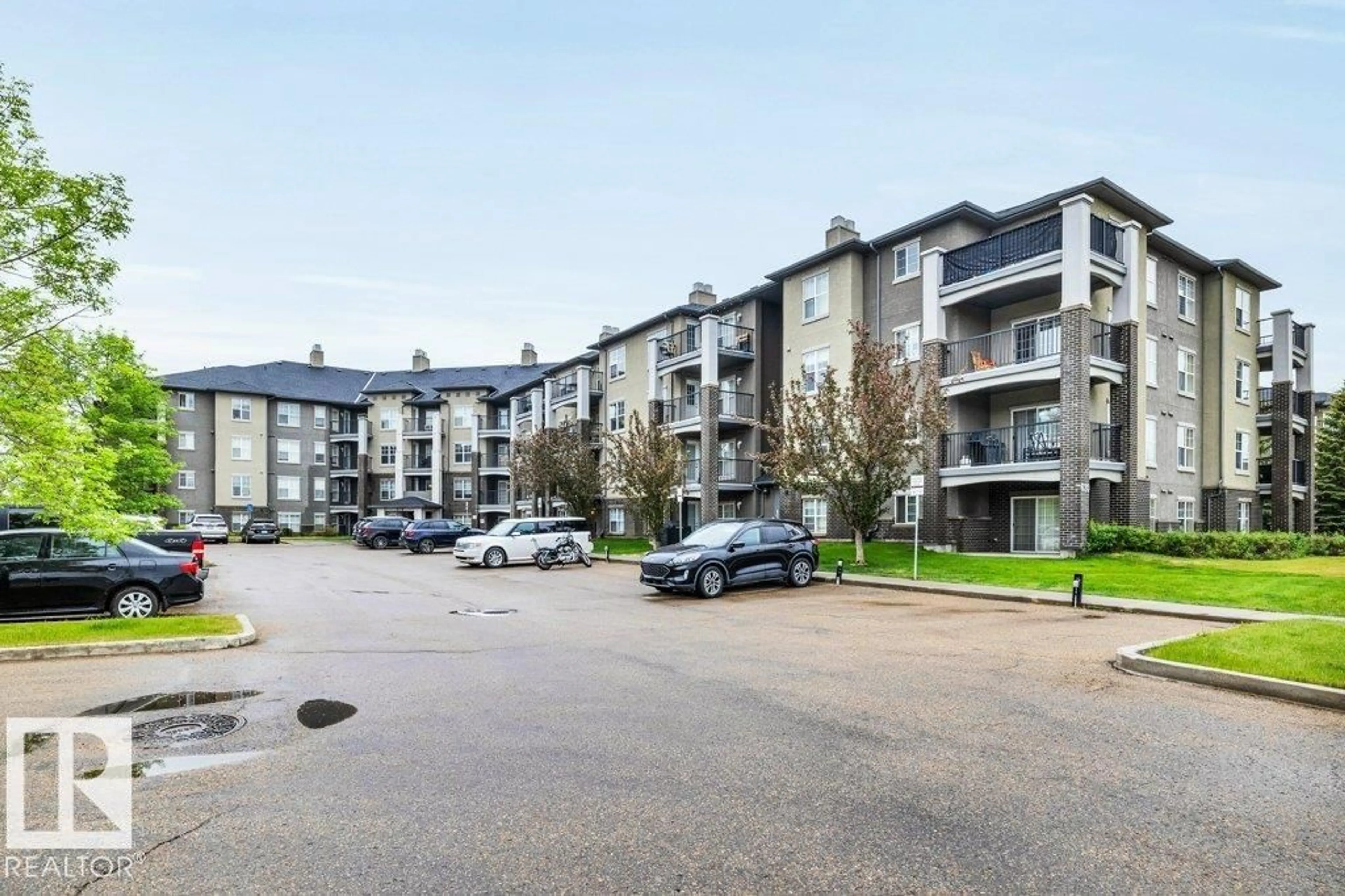 A pic from outside/outdoor area/front of a property/back of a property/a pic from drone, street for #116 - 630 MCALLISTER LO, Edmonton Alberta T6W1N3