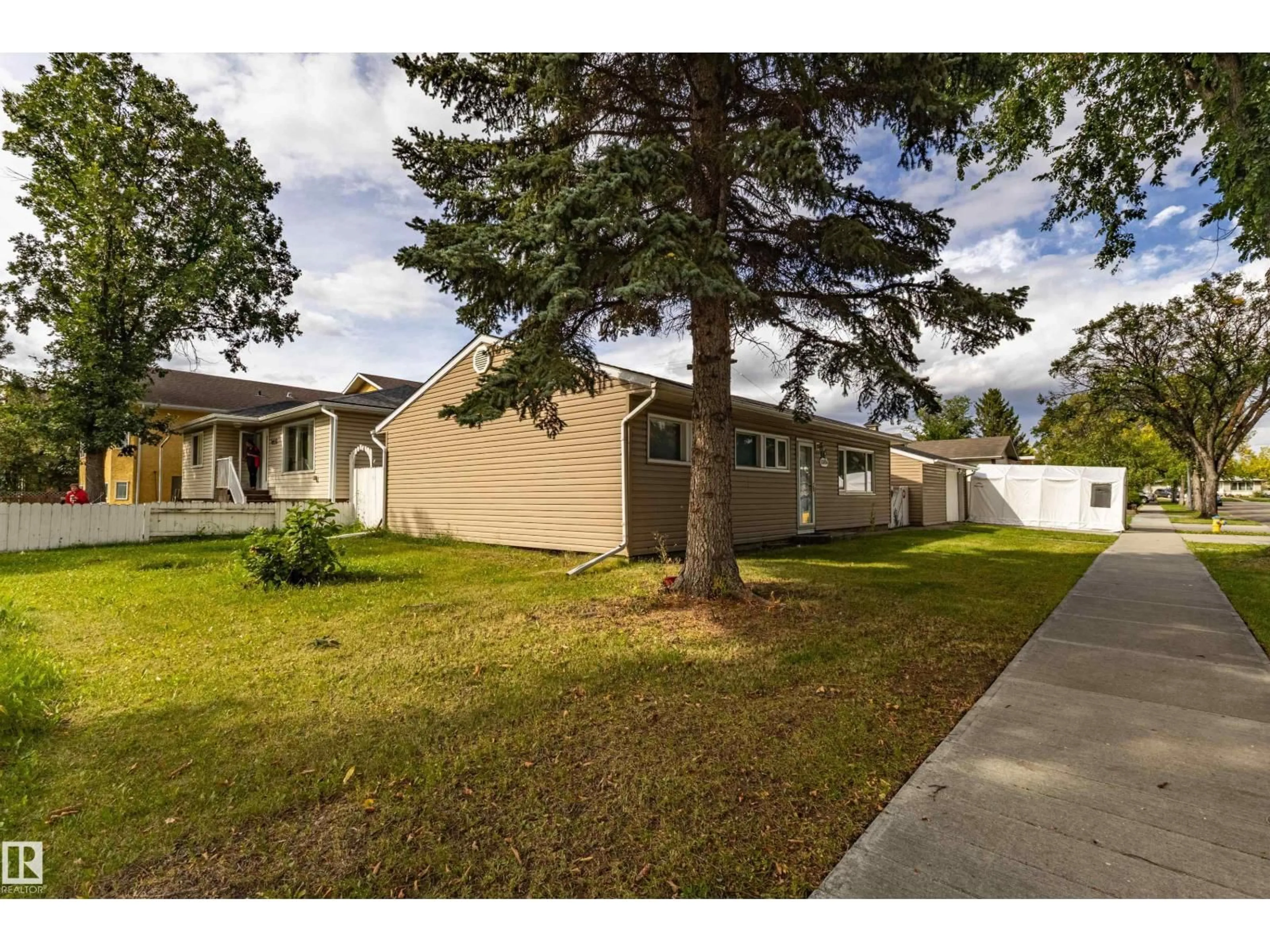 A pic from outside/outdoor area/front of a property/back of a property/a pic from drone, street for 13004 114 ST, Edmonton Alberta T5E5C9