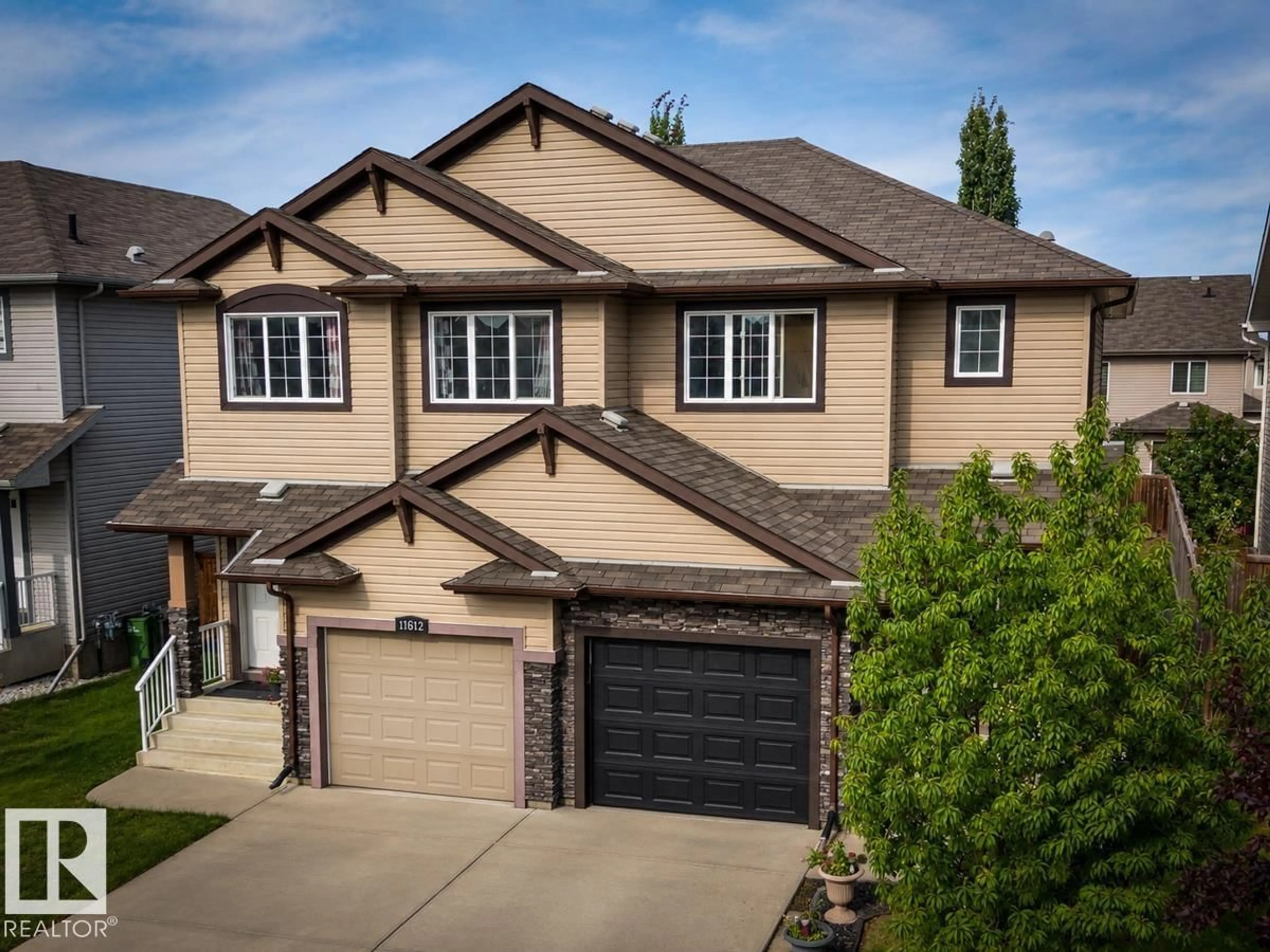 Home with brick exterior material, street for 11612 17 AV, Edmonton Alberta T6W1Y4