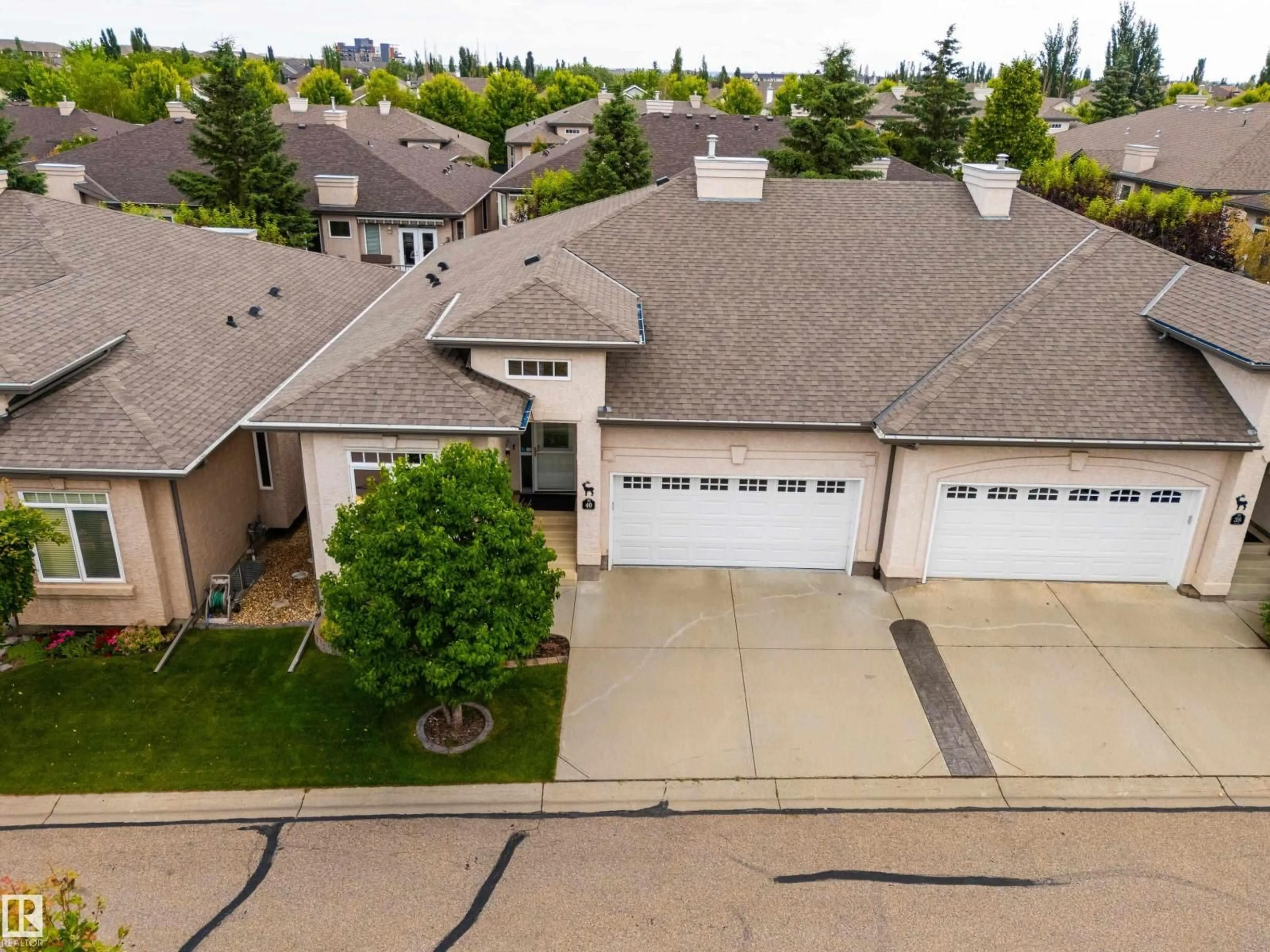A pic from outside/outdoor area/front of a property/back of a property/a pic from drone, street for #40 - 1251 RUTHERFORD RD, Edmonton Alberta T6W1T6
