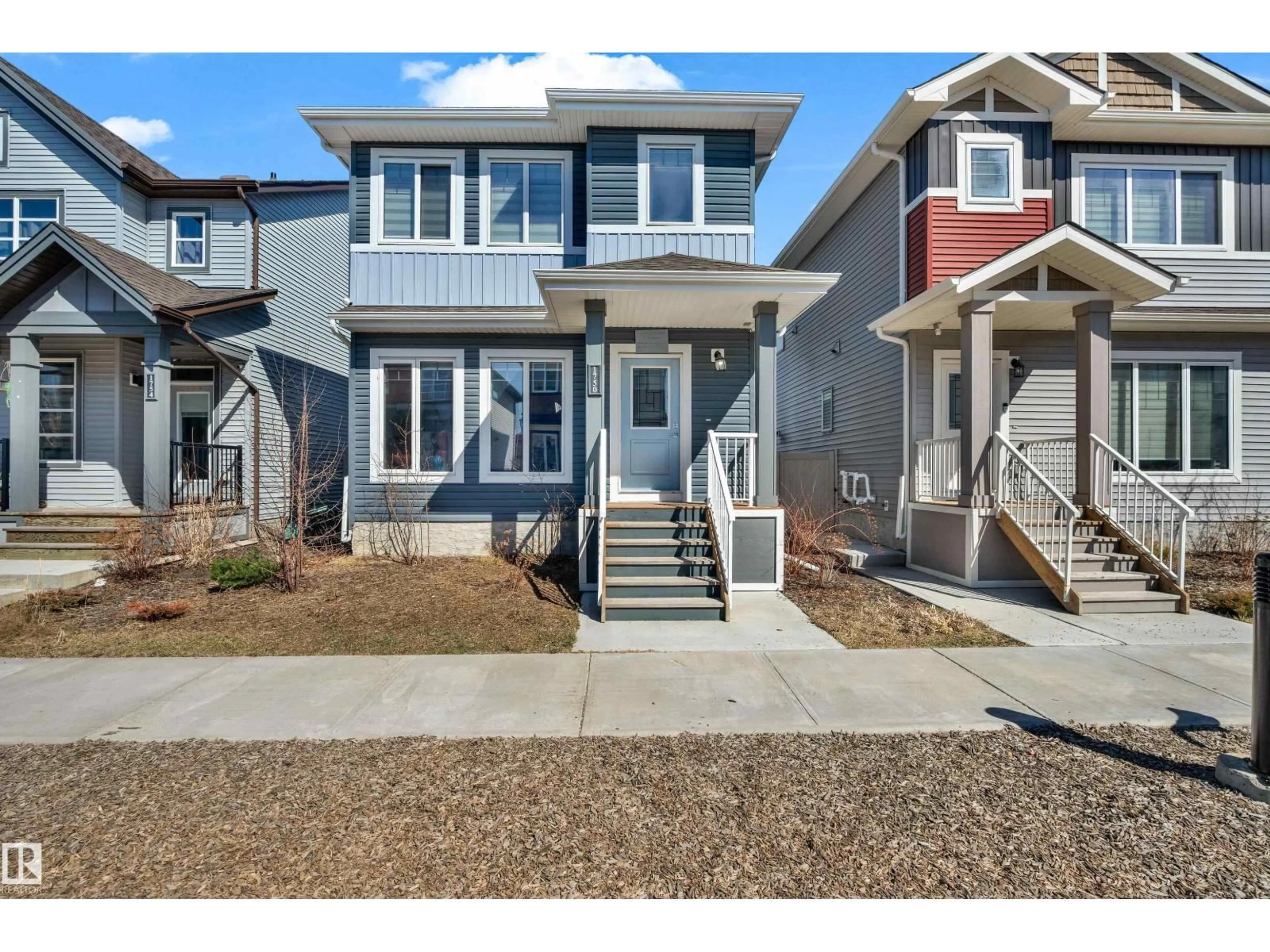 Home with vinyl exterior material, street for NW - 1750 25A ST, Edmonton Alberta T6T2H9