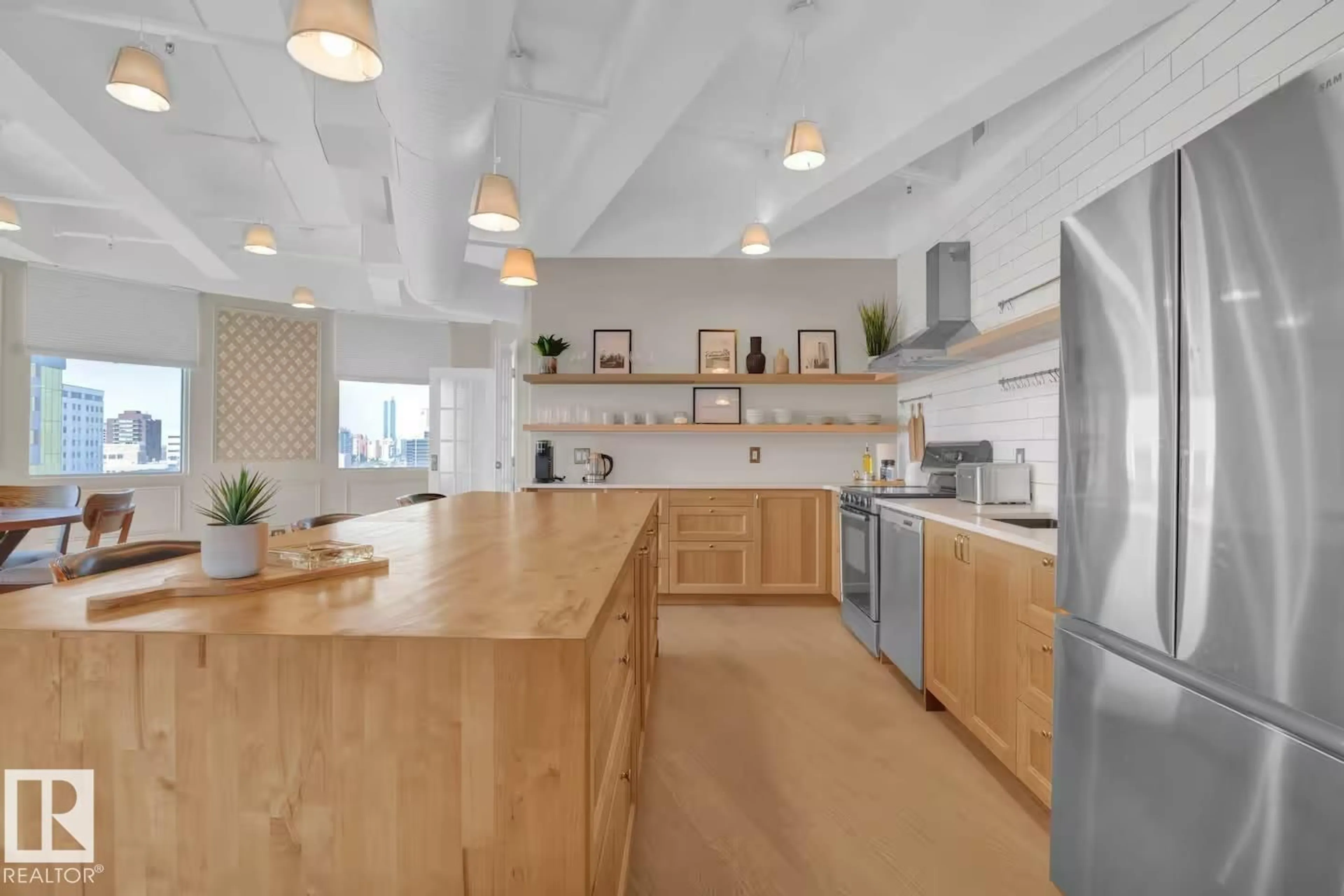 Open concept kitchen, wood/laminate floor for #904 - 10105 109 ST, Edmonton Alberta T5J1M8
