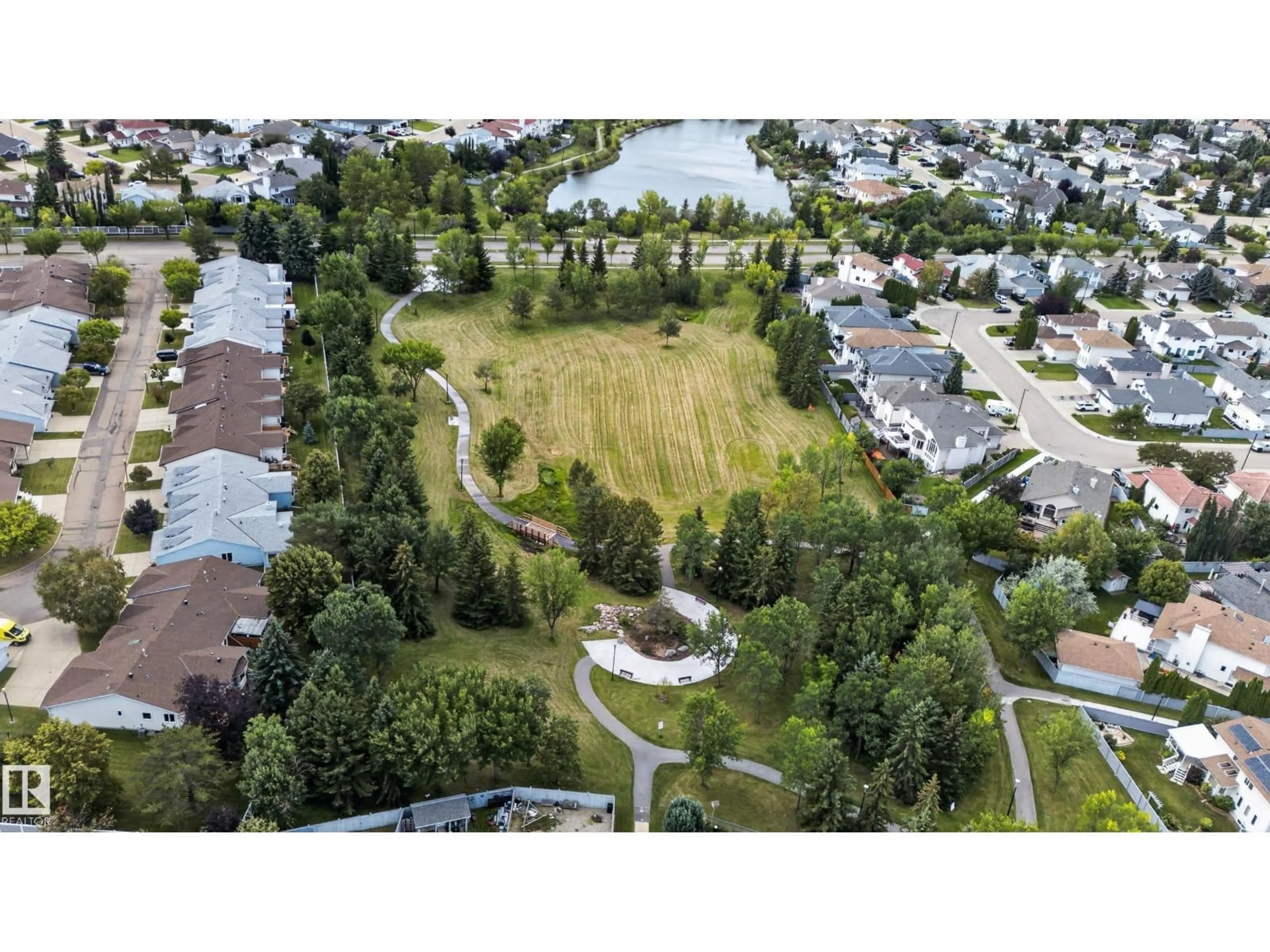 A pic from outside/outdoor area/front of a property/back of a property/a pic from drone, mountain view for NW - 9826 180 AV, Edmonton Alberta T5X6A1