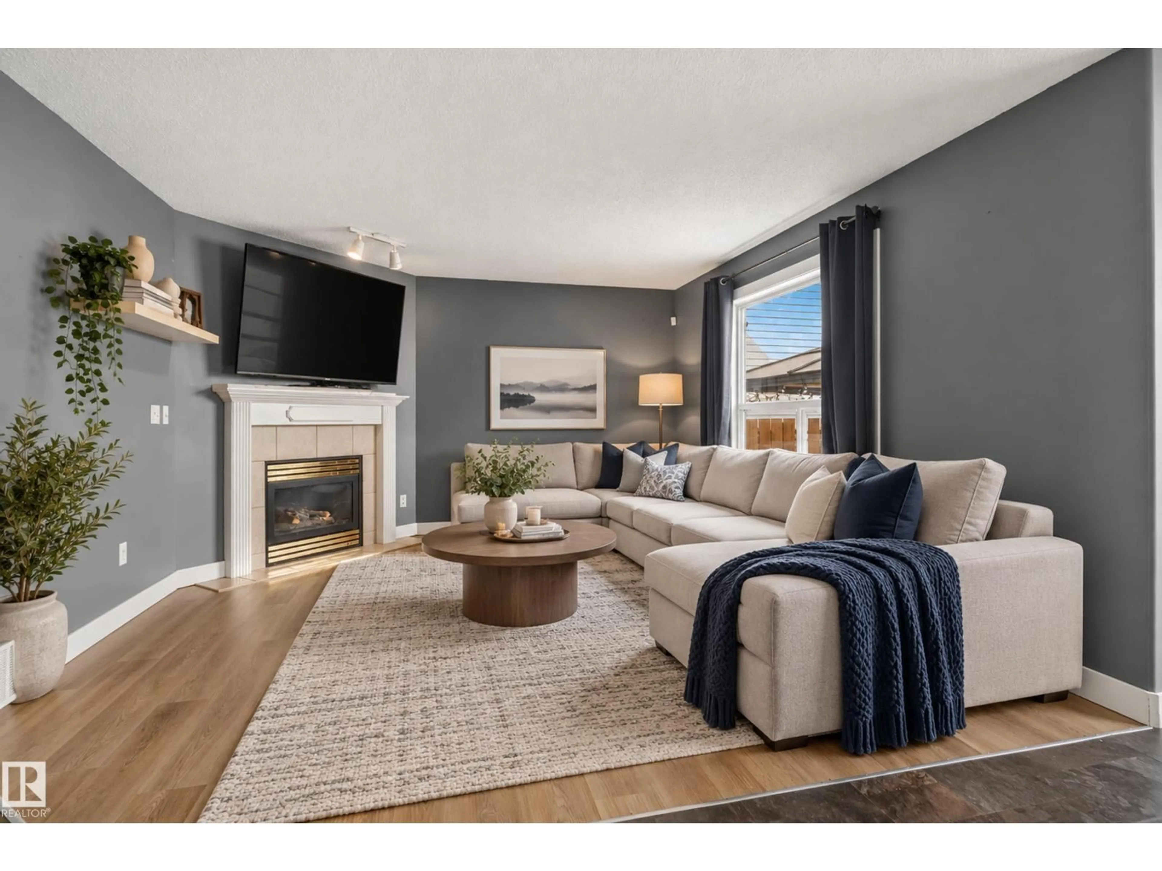 Living room with furniture, unknown for NW - 9826 180 AV, Edmonton Alberta T5X6A1