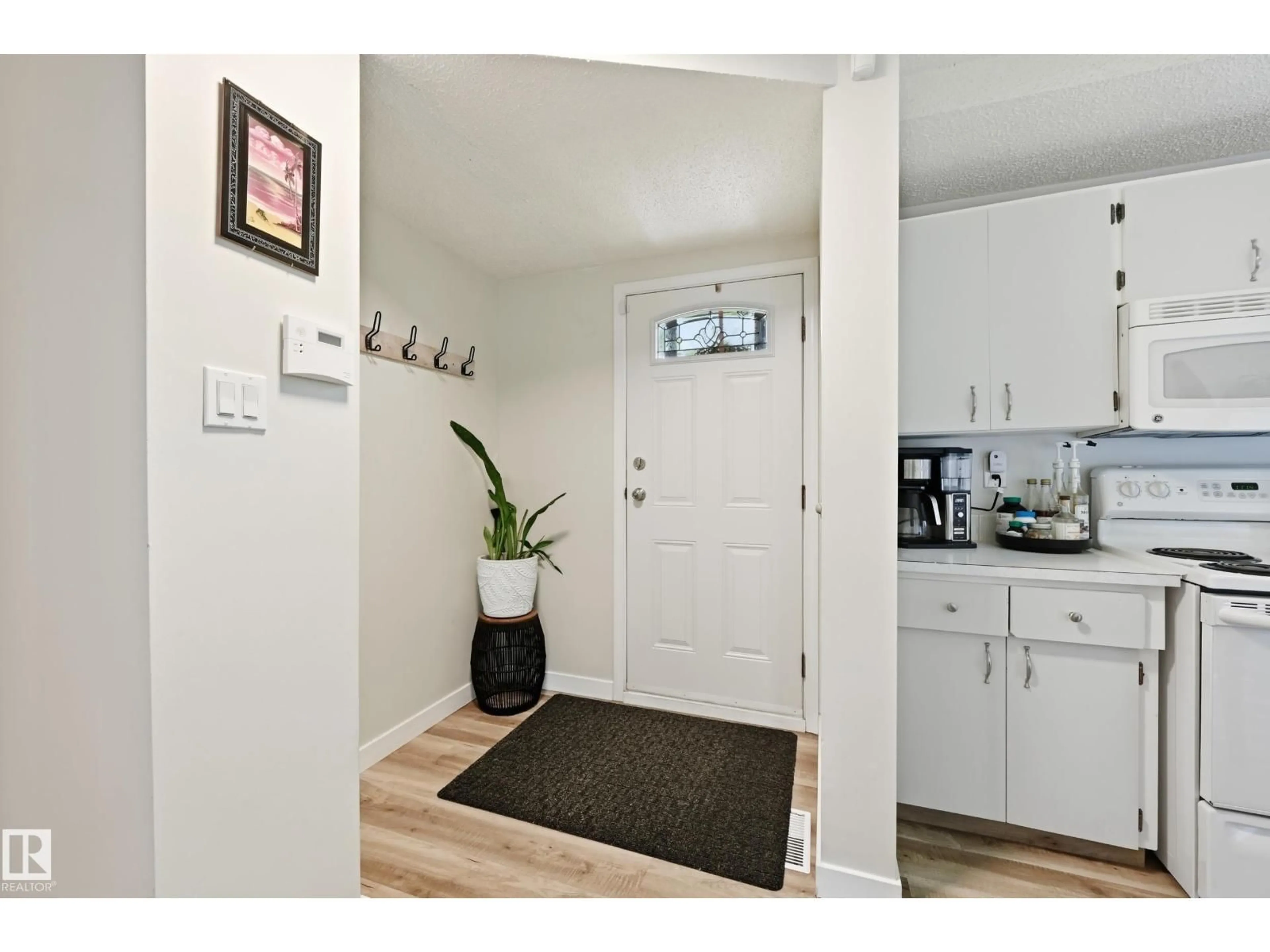 Indoor entryway for 5677 137 AV, Edmonton Alberta T5A2H4