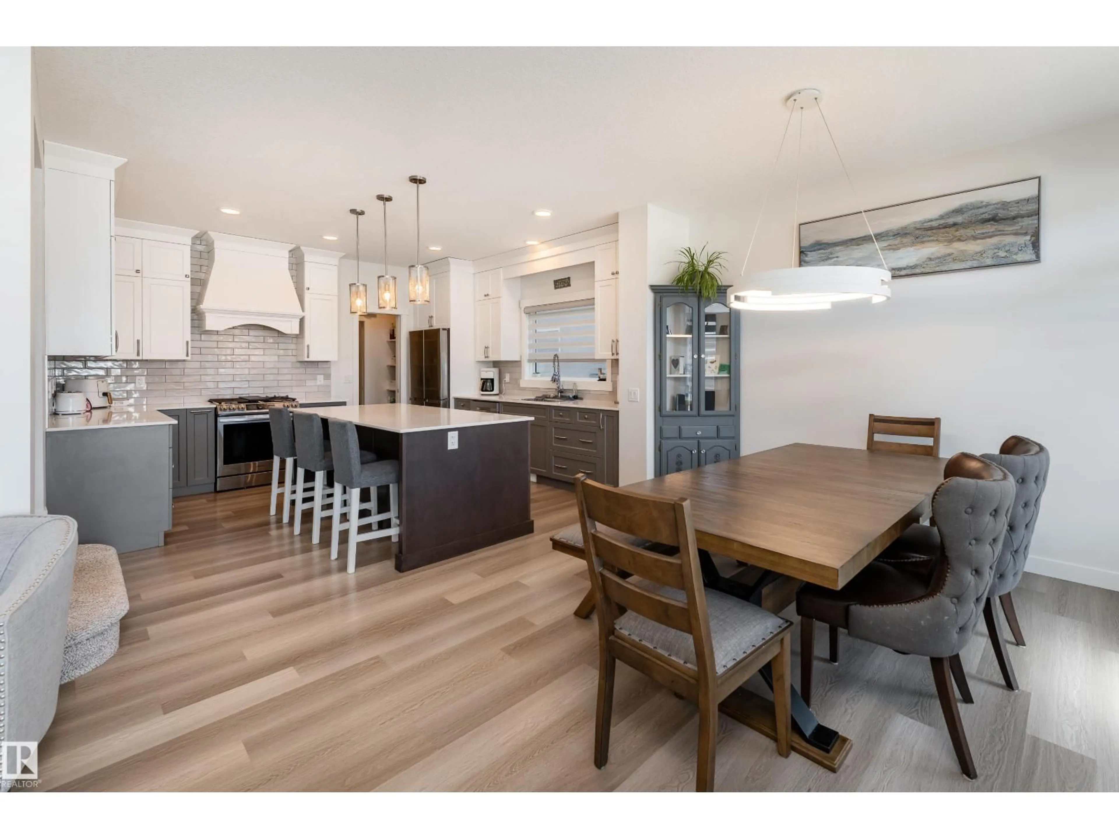 Open concept kitchen, wood/laminate floor for 9119 183 AV, Edmonton Alberta T5Z0S6