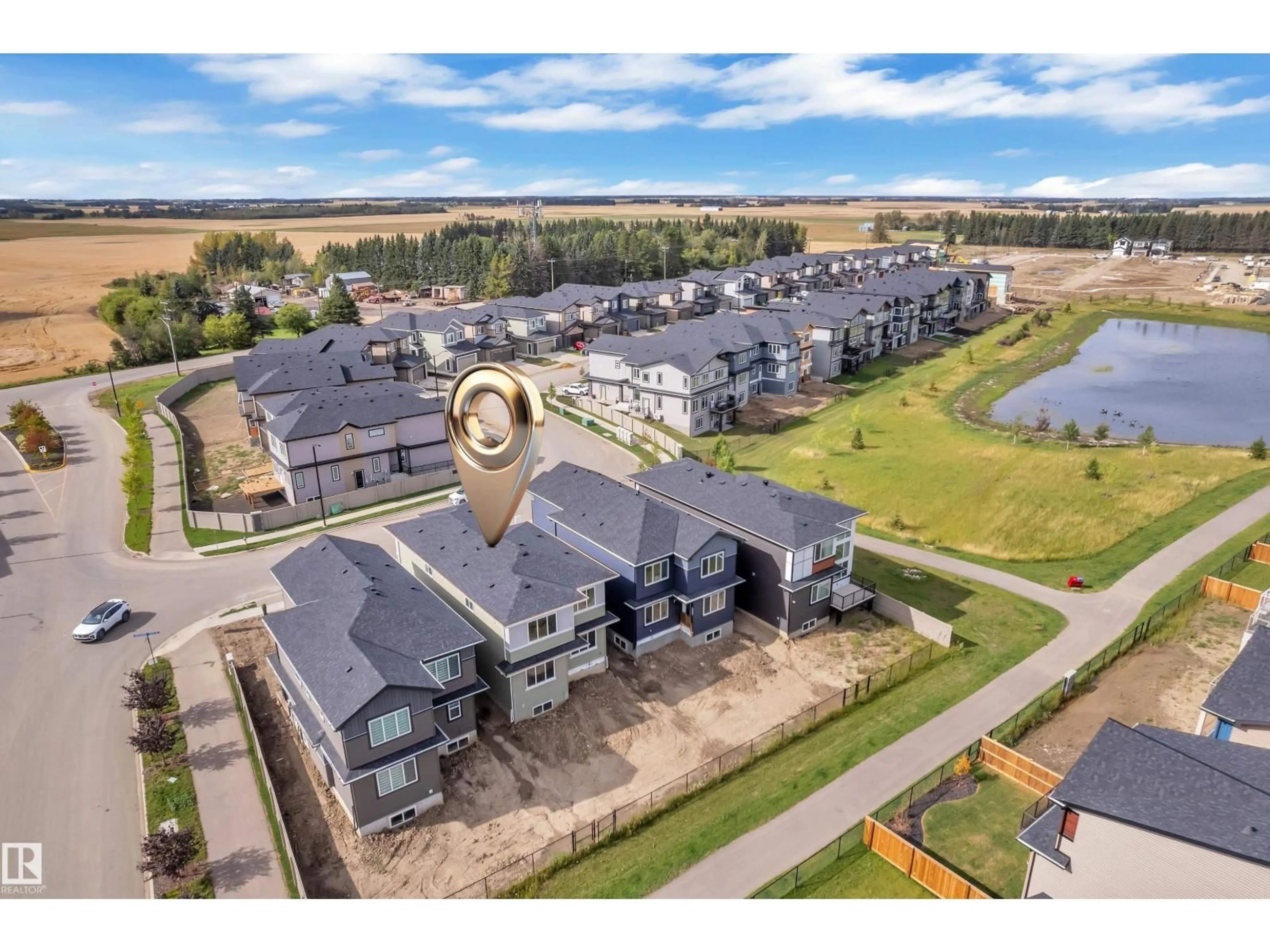 A pic from outside/outdoor area/front of a property/back of a property/a pic from drone, mountain view for 202 LINDEN LO, Leduc Alberta T9E1T2