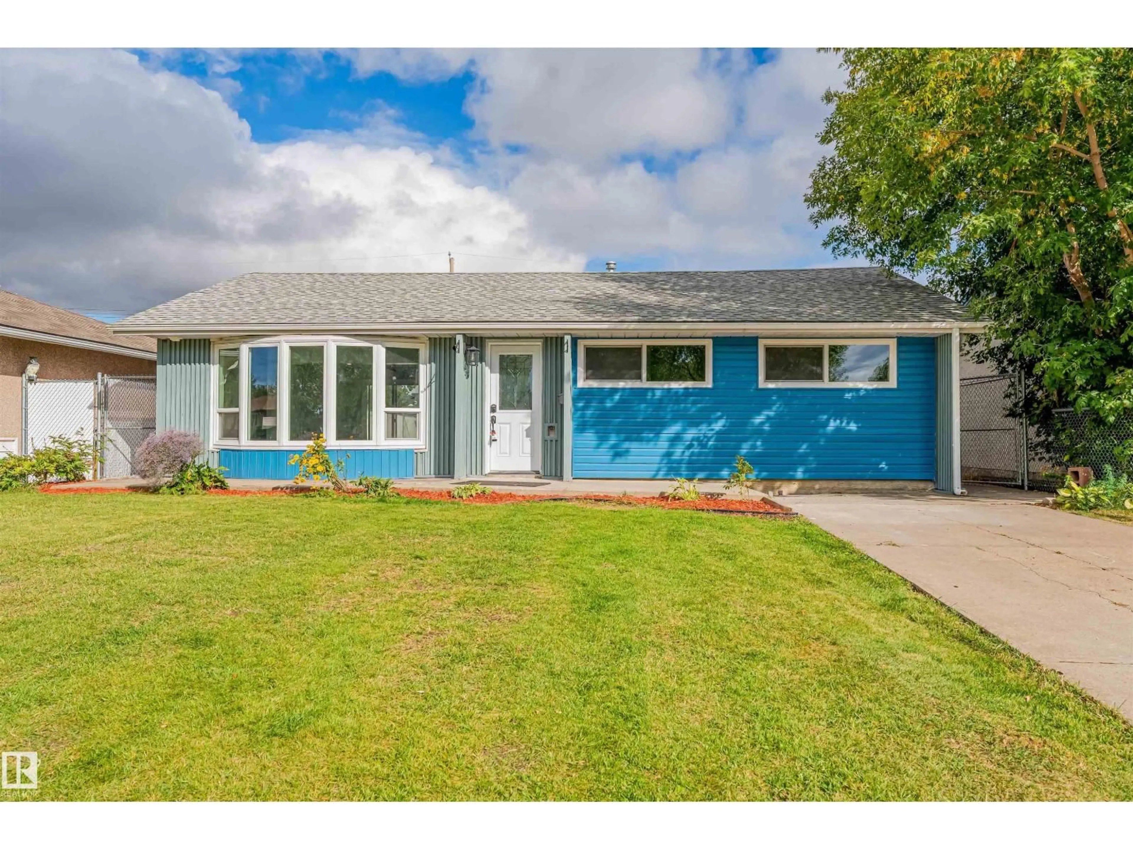 Home with vinyl exterior material, street for NW - 13423 112 ST, Edmonton Alberta T5E5A3
