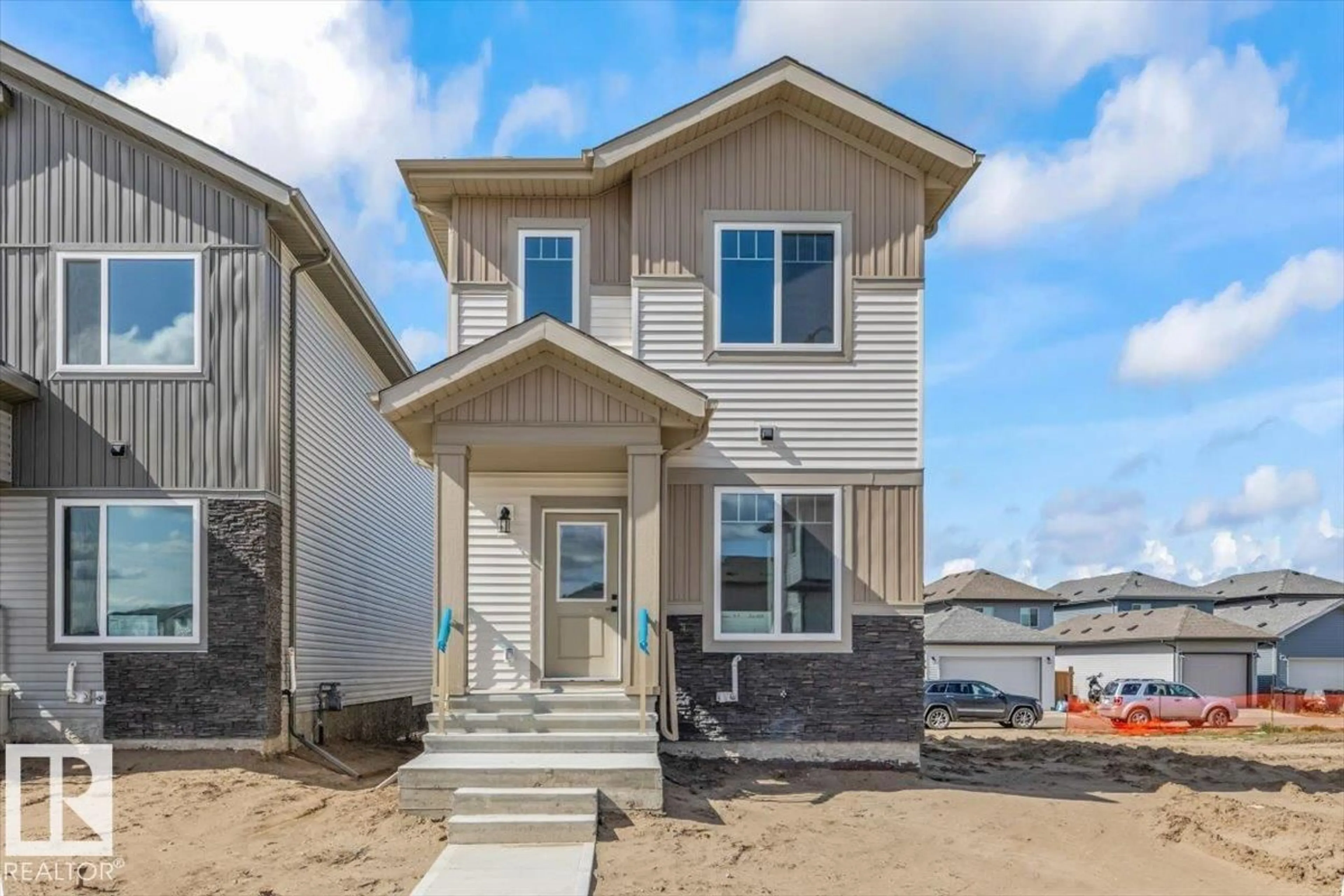 Home with vinyl exterior material, street for 22 JUNIPER WD, Fort Saskatchewan Alberta T8L3S4
