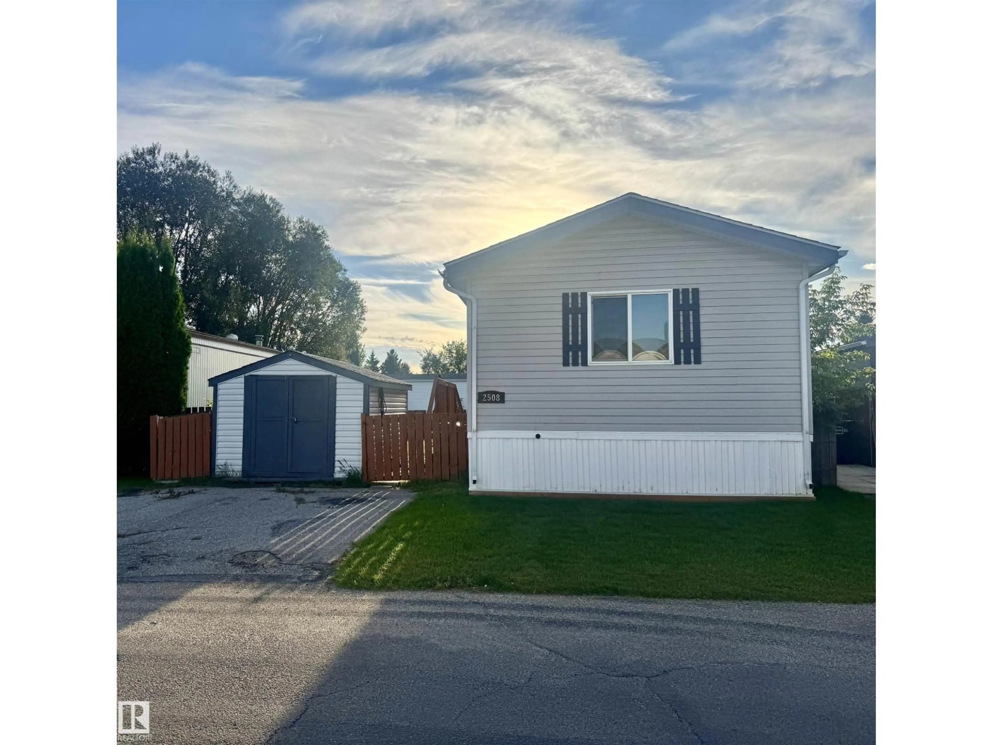 Home with vinyl exterior material, street for 2508 WEST PORT RD, Edmonton Alberta T5S1T5