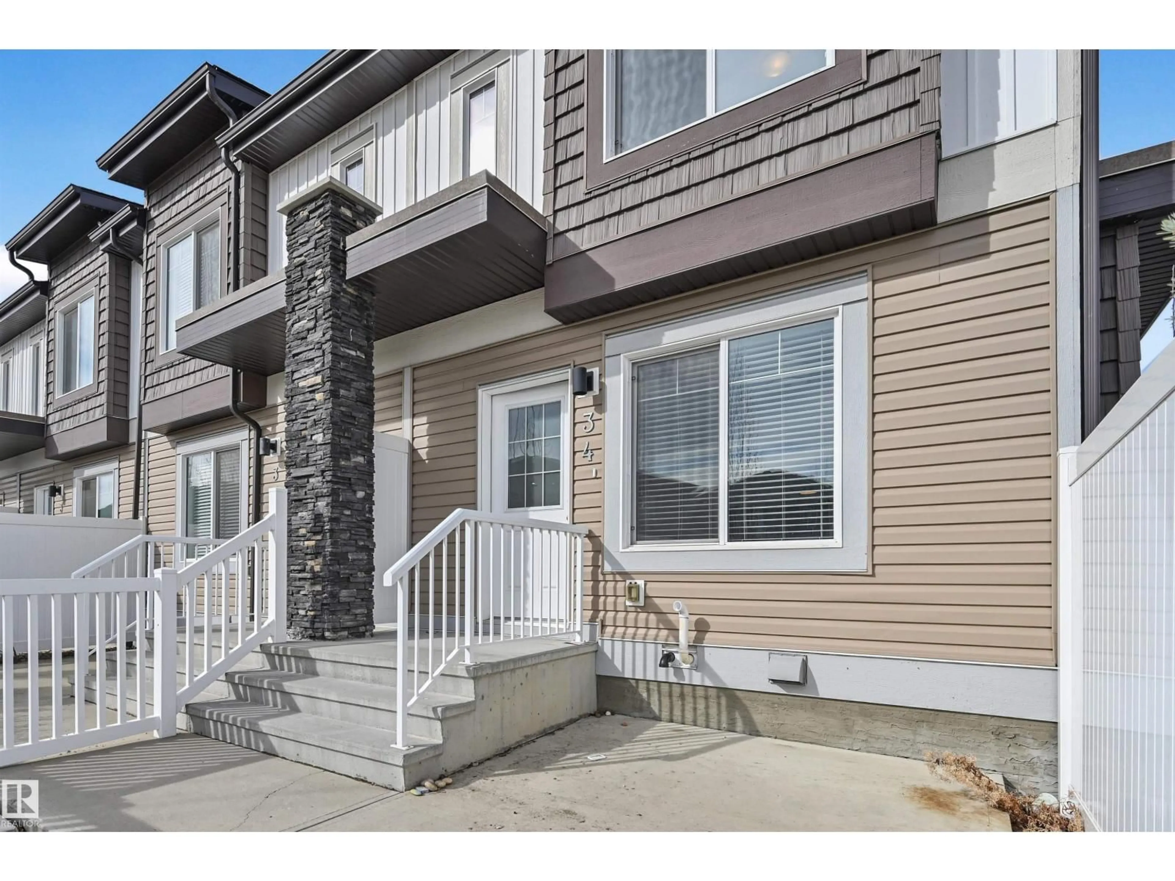 Home with vinyl exterior material, street for #34 - 2215 24 ST, Edmonton Alberta T6T1A6