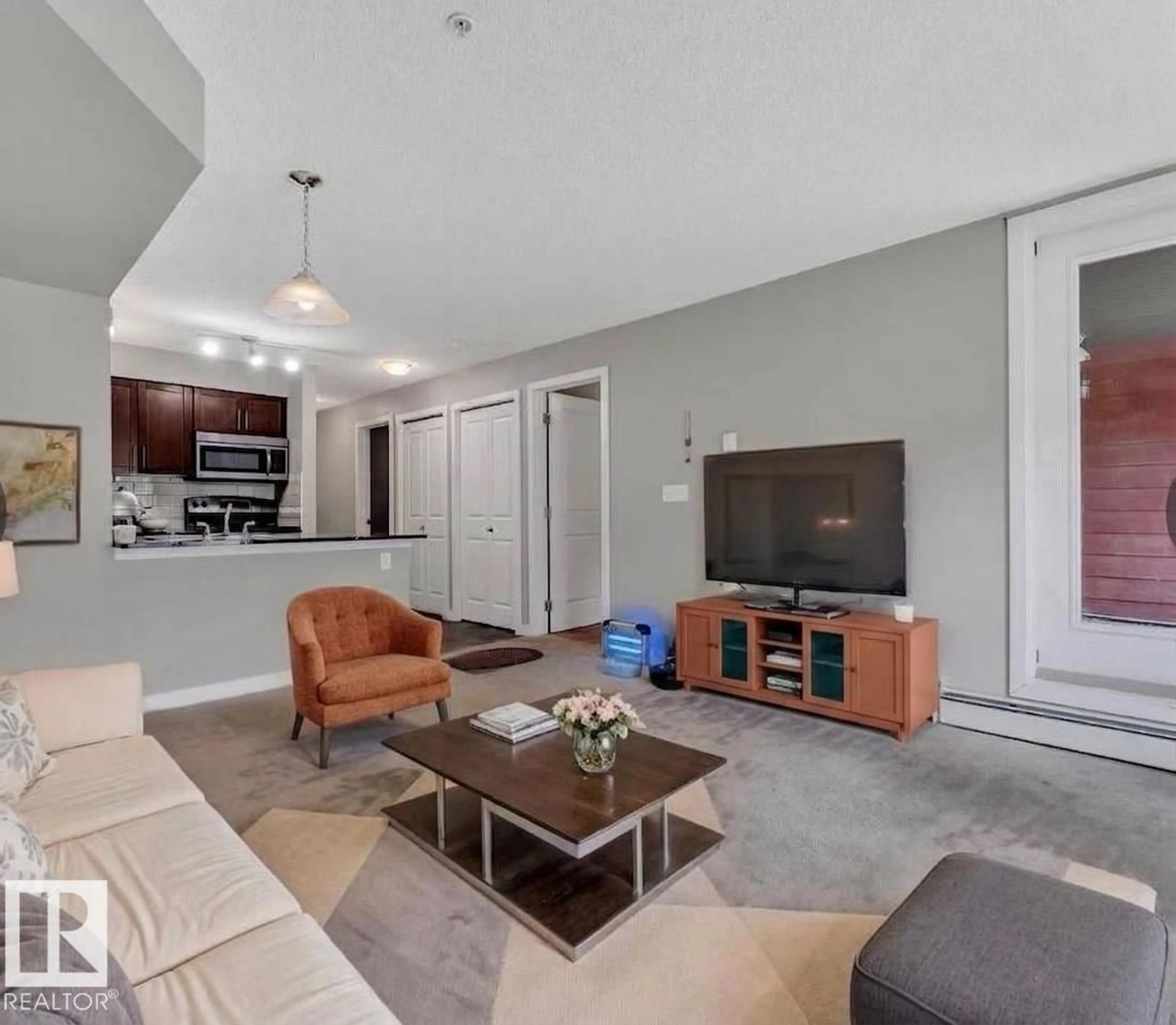 Living room with furniture, unknown for #103 - 107 WATT CM, Edmonton Alberta T6X2C6