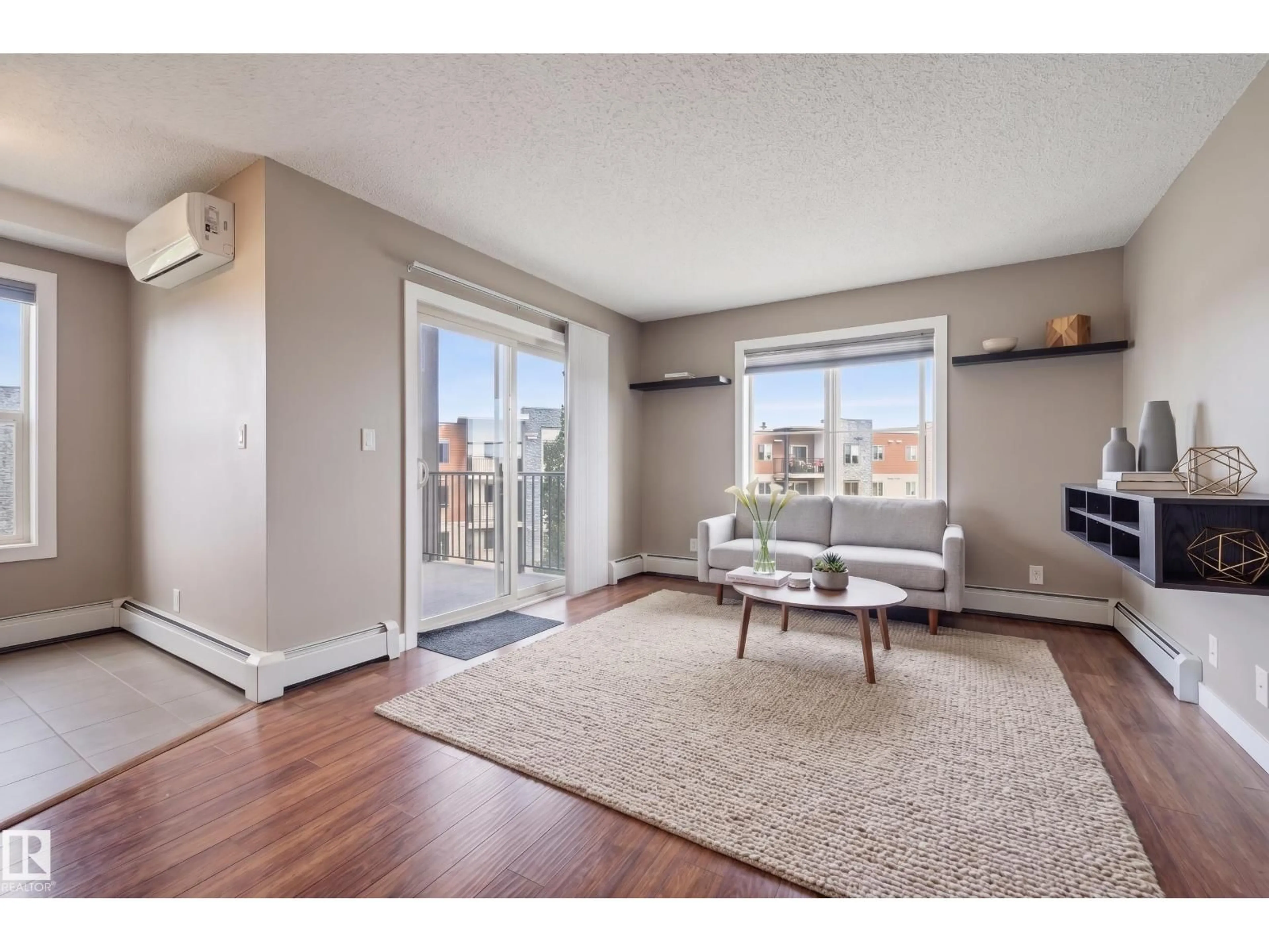 Living room with furniture, unknown for #415 - 11820 22 AV, Edmonton Alberta T6W2A2