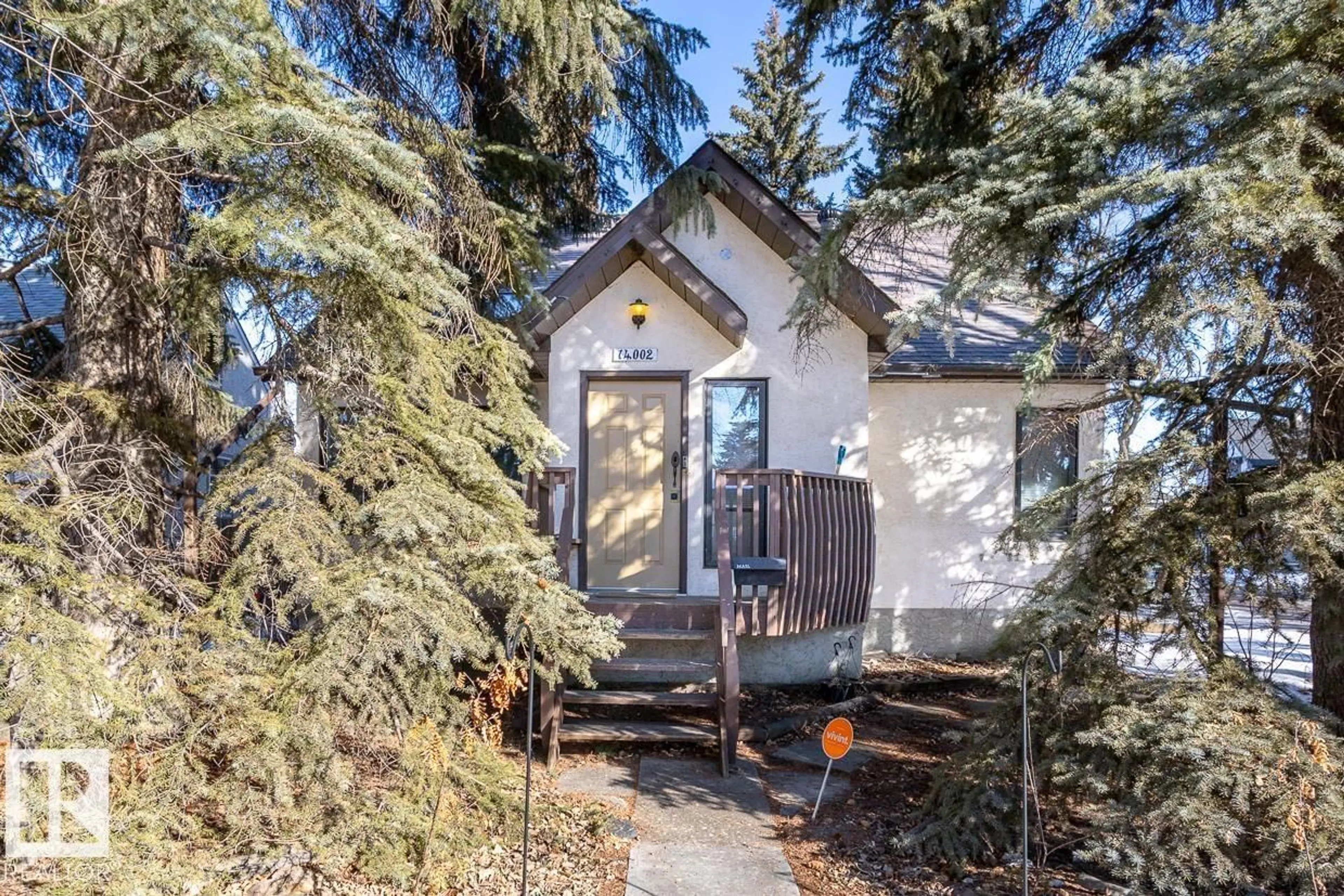 Home with vinyl exterior material, street for 14002 106 AV, Edmonton Alberta T5N1B2