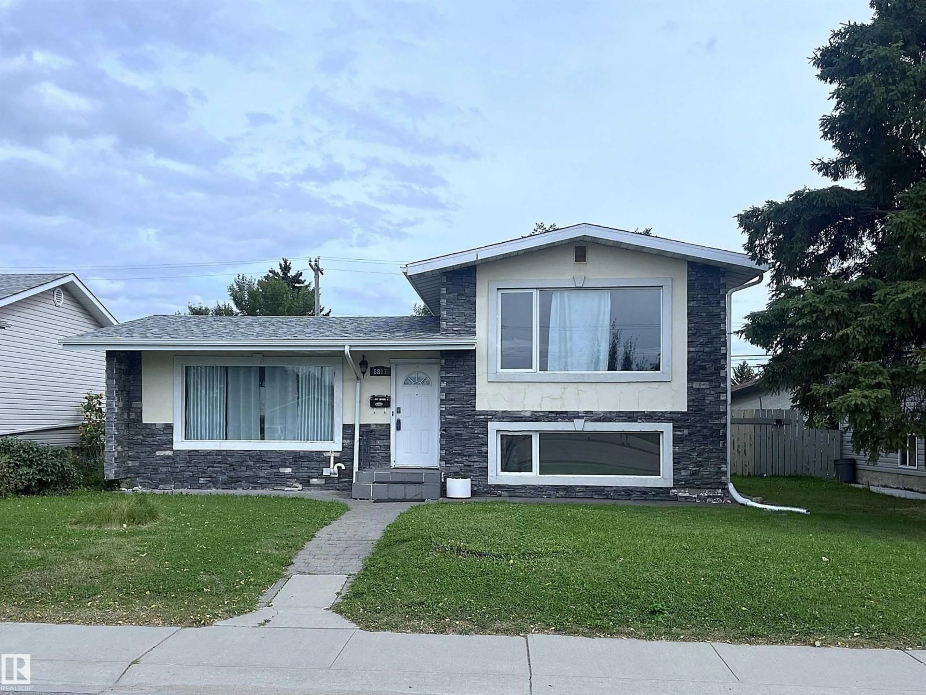 Home with vinyl exterior material, street for 8817 163 ST, Edmonton Alberta T5R2N8