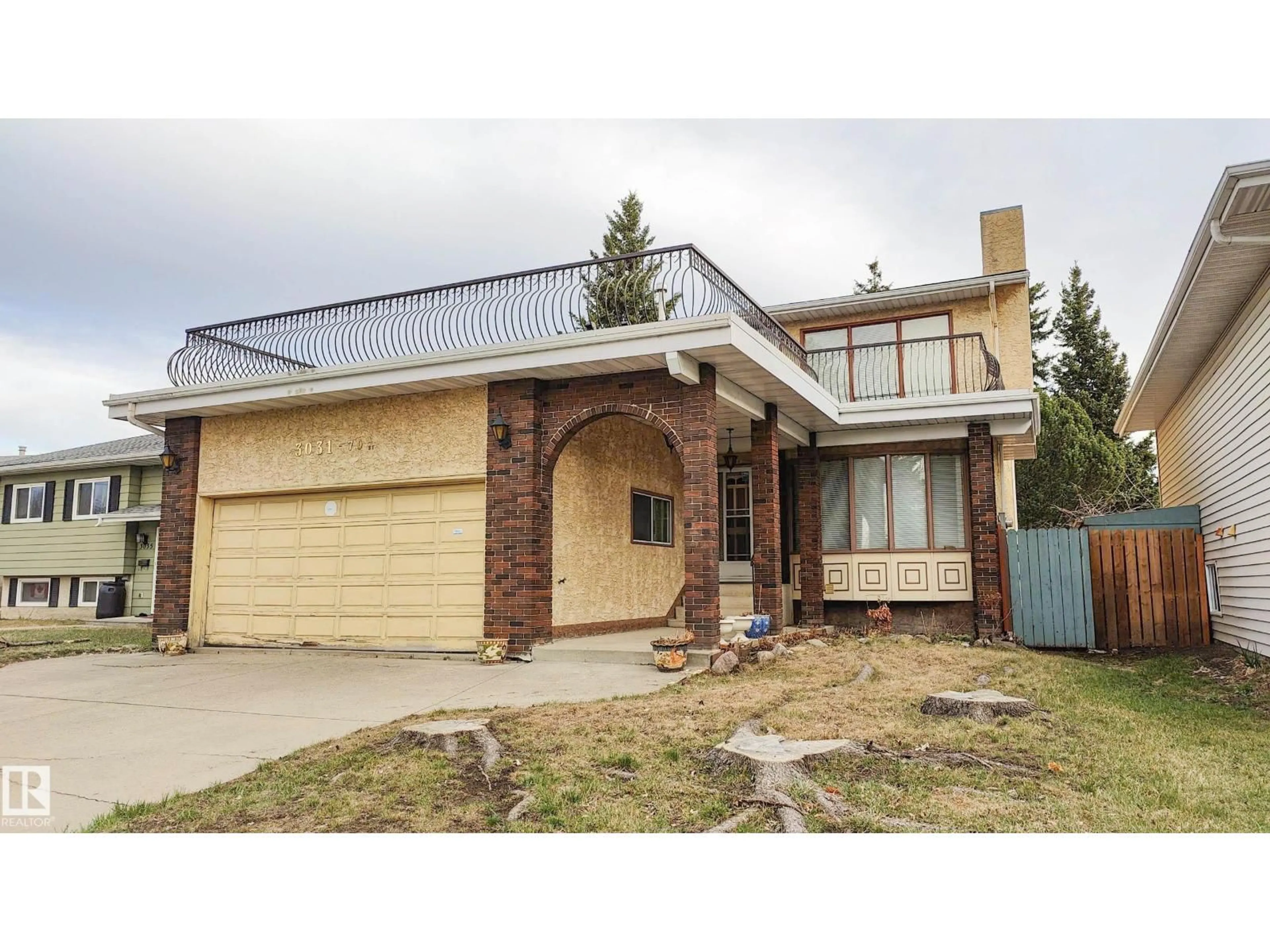 Home with brick exterior material, street for NW - 3031 79 ST, Edmonton Alberta T6K3N2