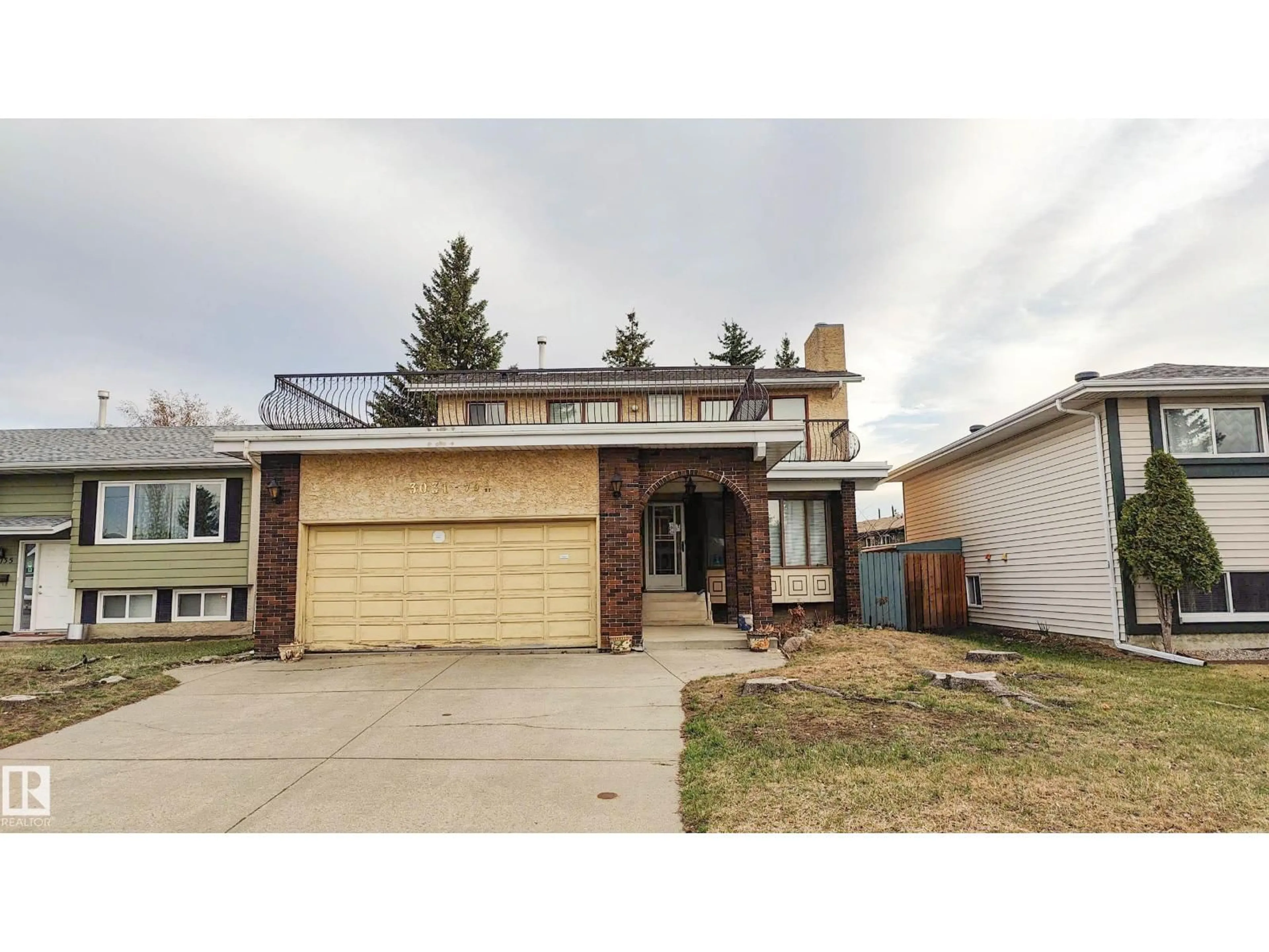 Home with vinyl exterior material, street for NW - 3031 79 ST, Edmonton Alberta T6K3N2