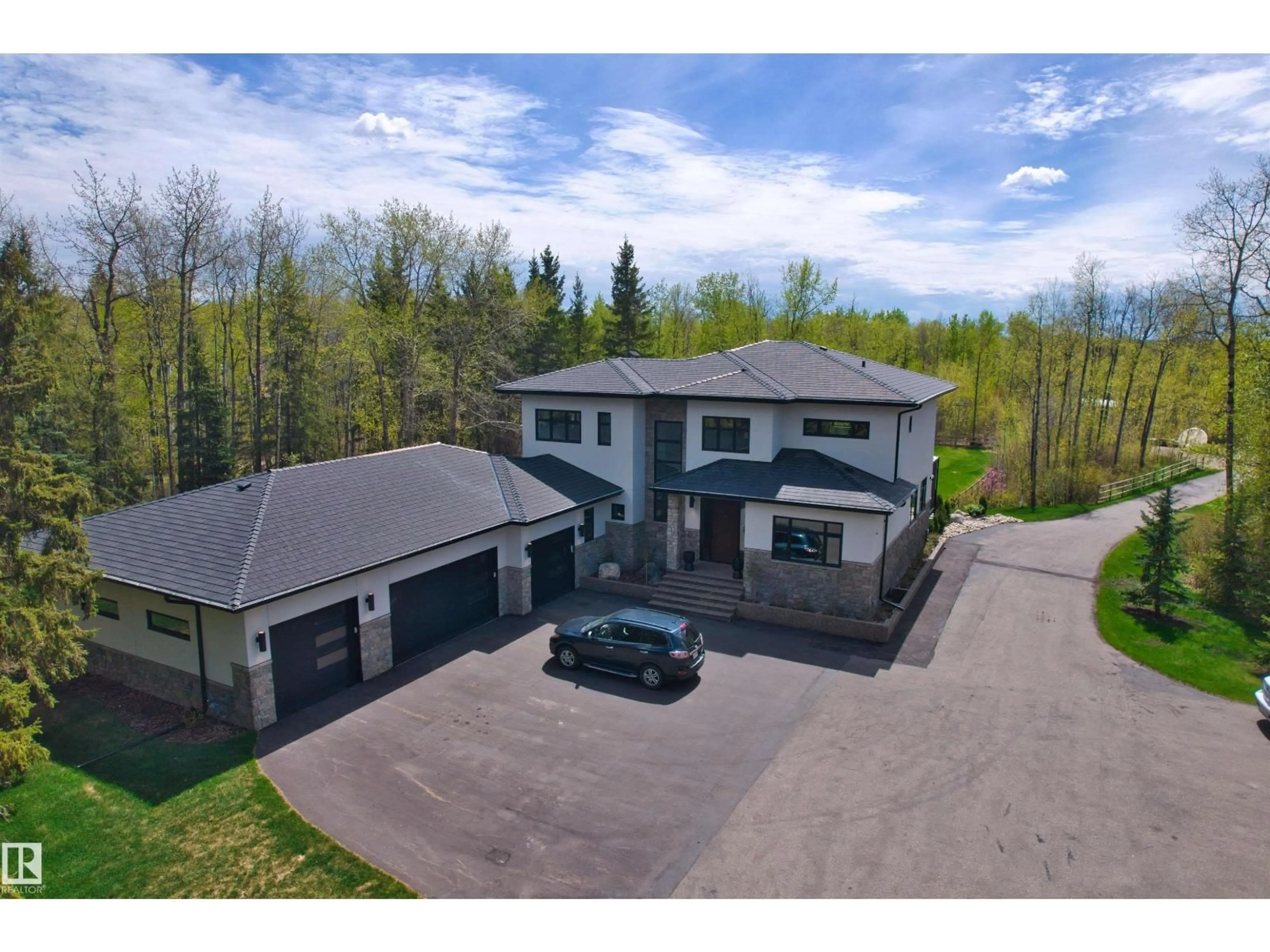 A pic from outside/outdoor area/front of a property/back of a property/a pic from drone, unknown for 22433 TWP ROAD 520, Rural Strathcona County Alberta T8C1E4