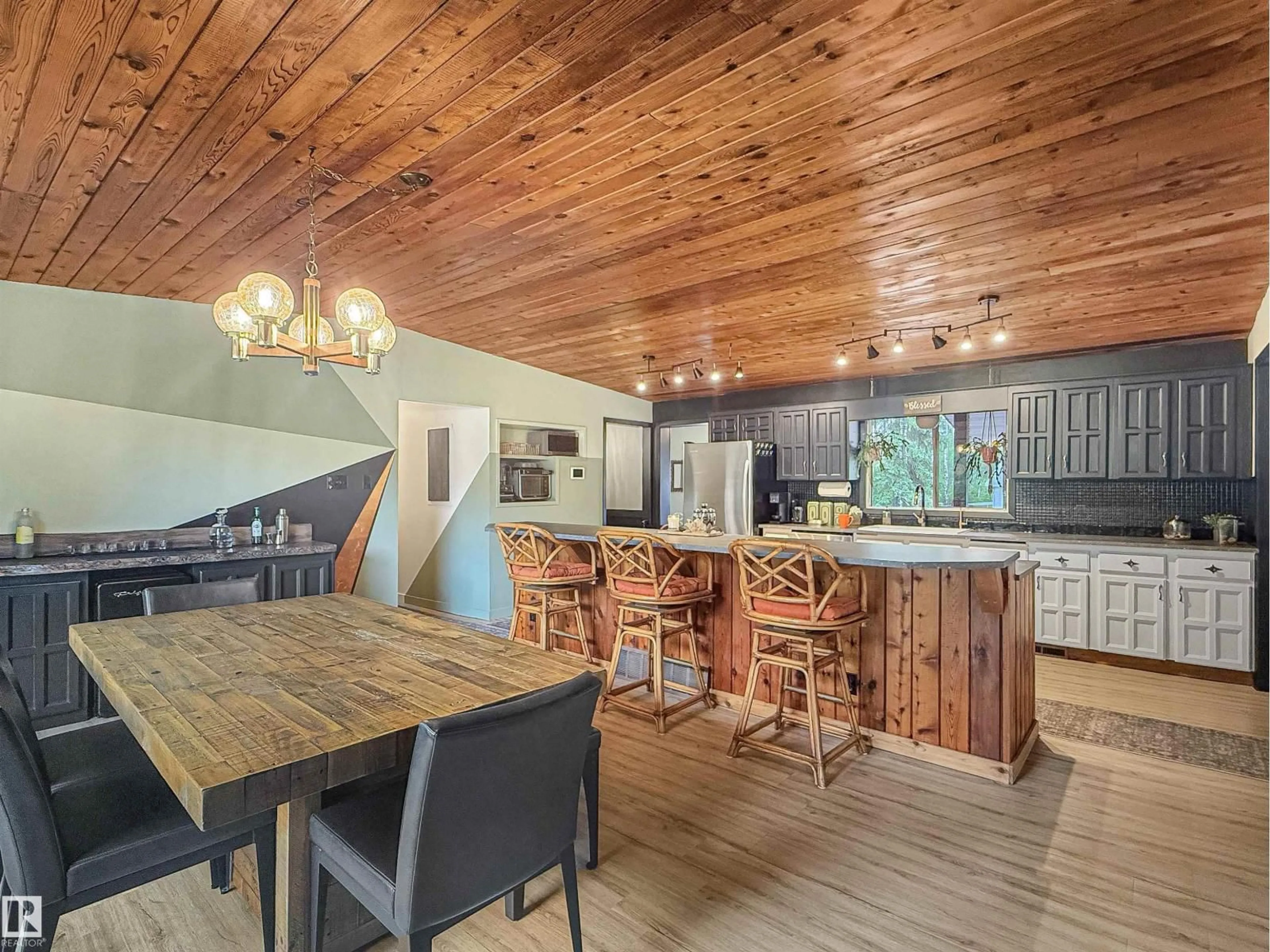 Open concept kitchen, wood/laminate floor for 26127 TWP ROAD 514, Rural Parkland County Alberta T7Y1B5