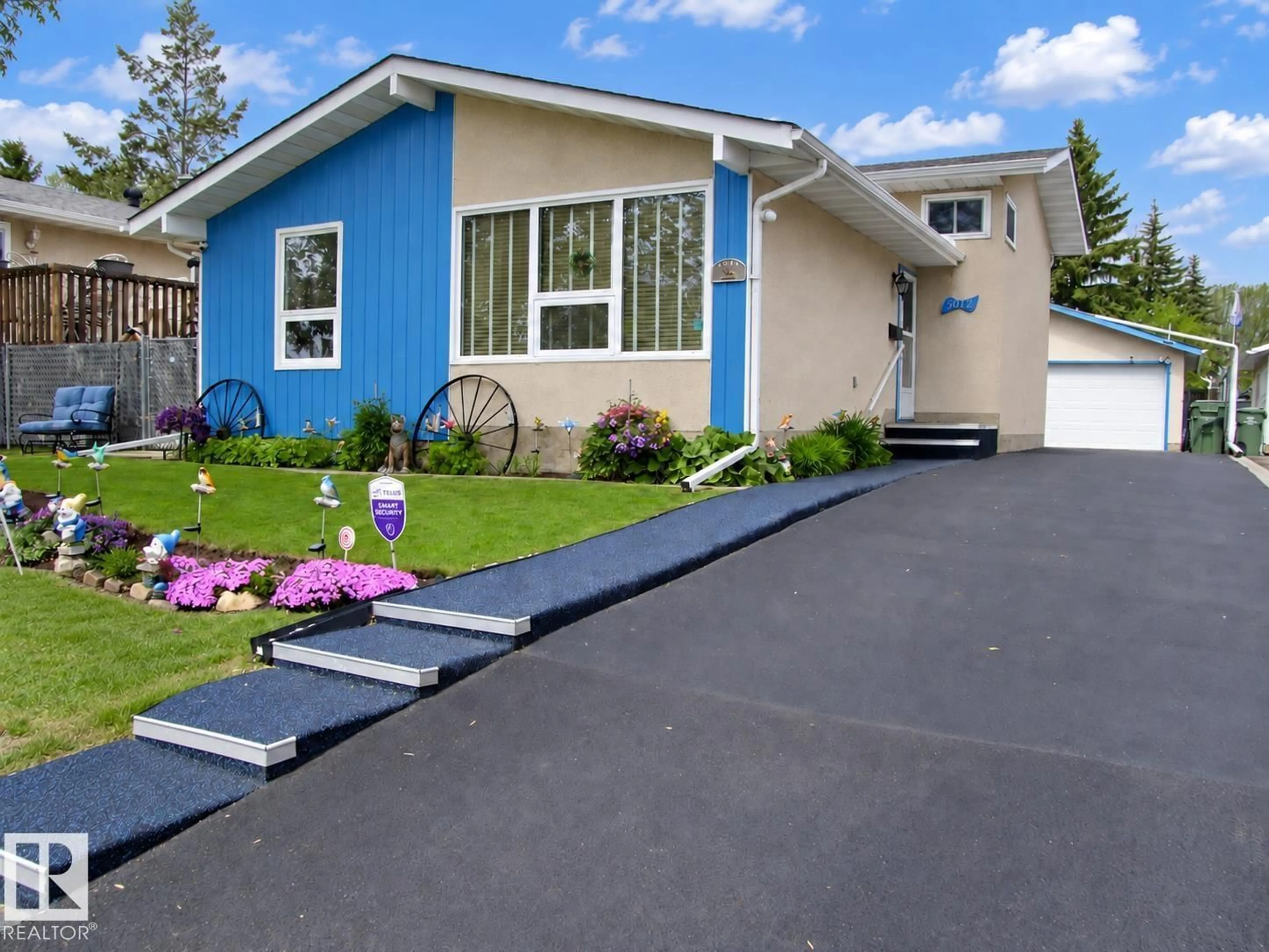 Home with vinyl exterior material, street for 5012 57 AV, Leduc Alberta T9E5S3