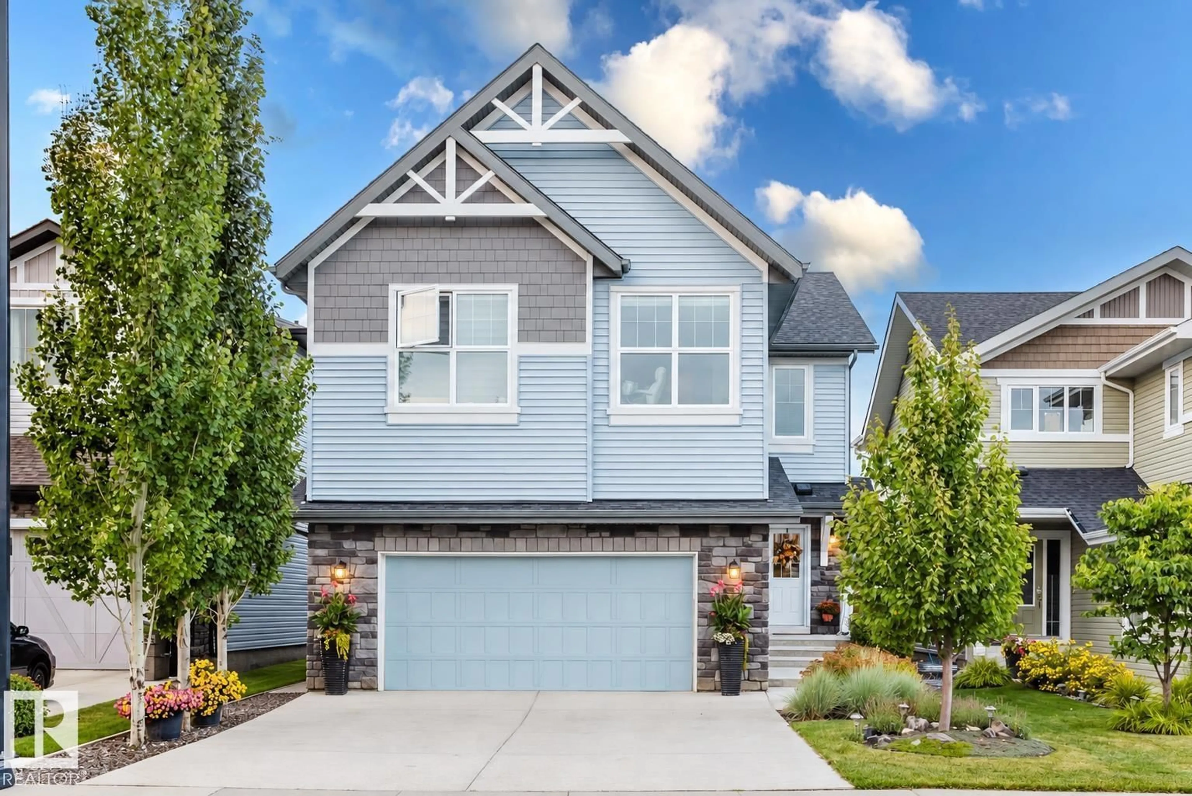 Home with vinyl exterior material, street for 15820 15 AV, Edmonton Alberta T6W3E6