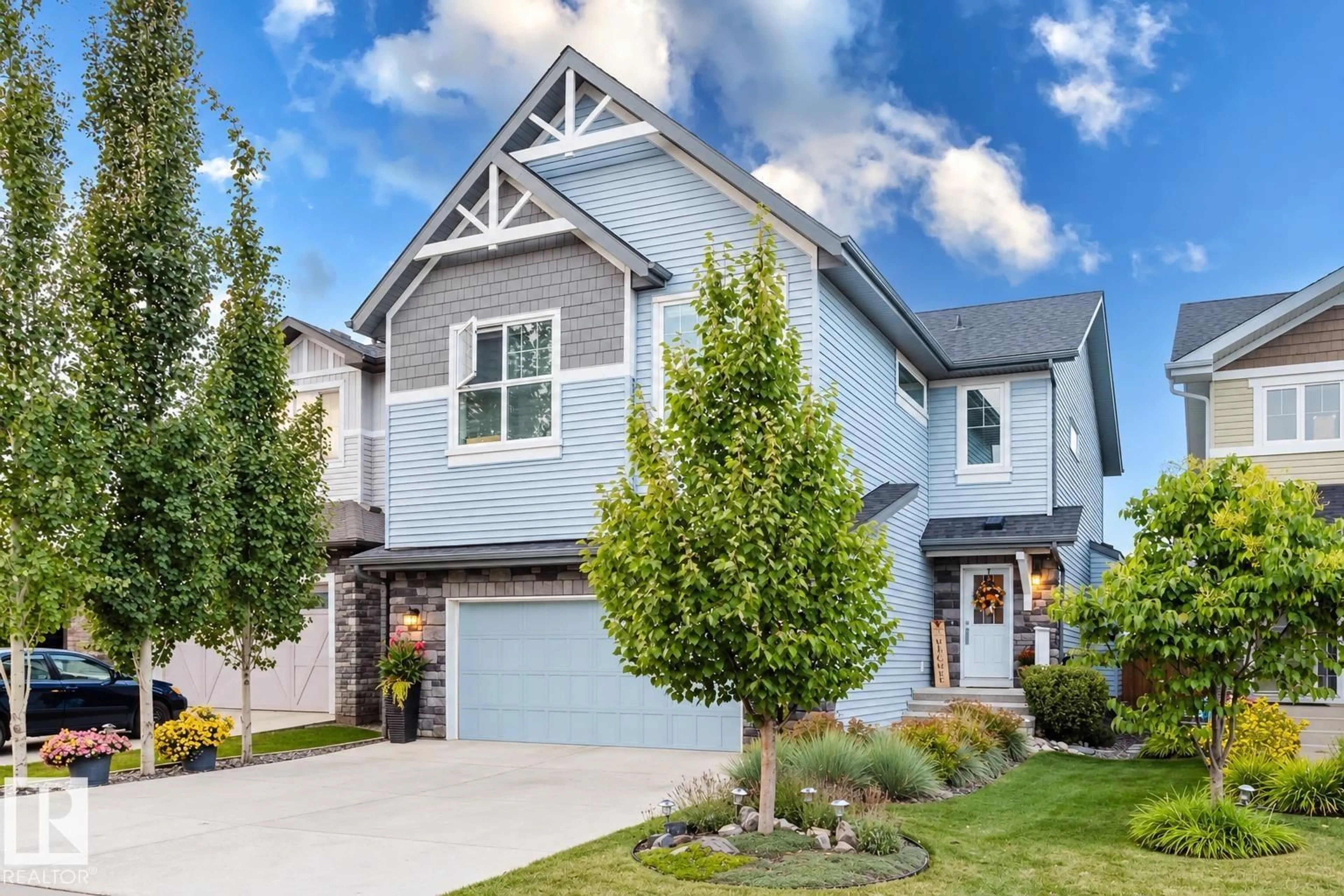 Home with brick exterior material, street for 15820 15 AV, Edmonton Alberta T6W3E6